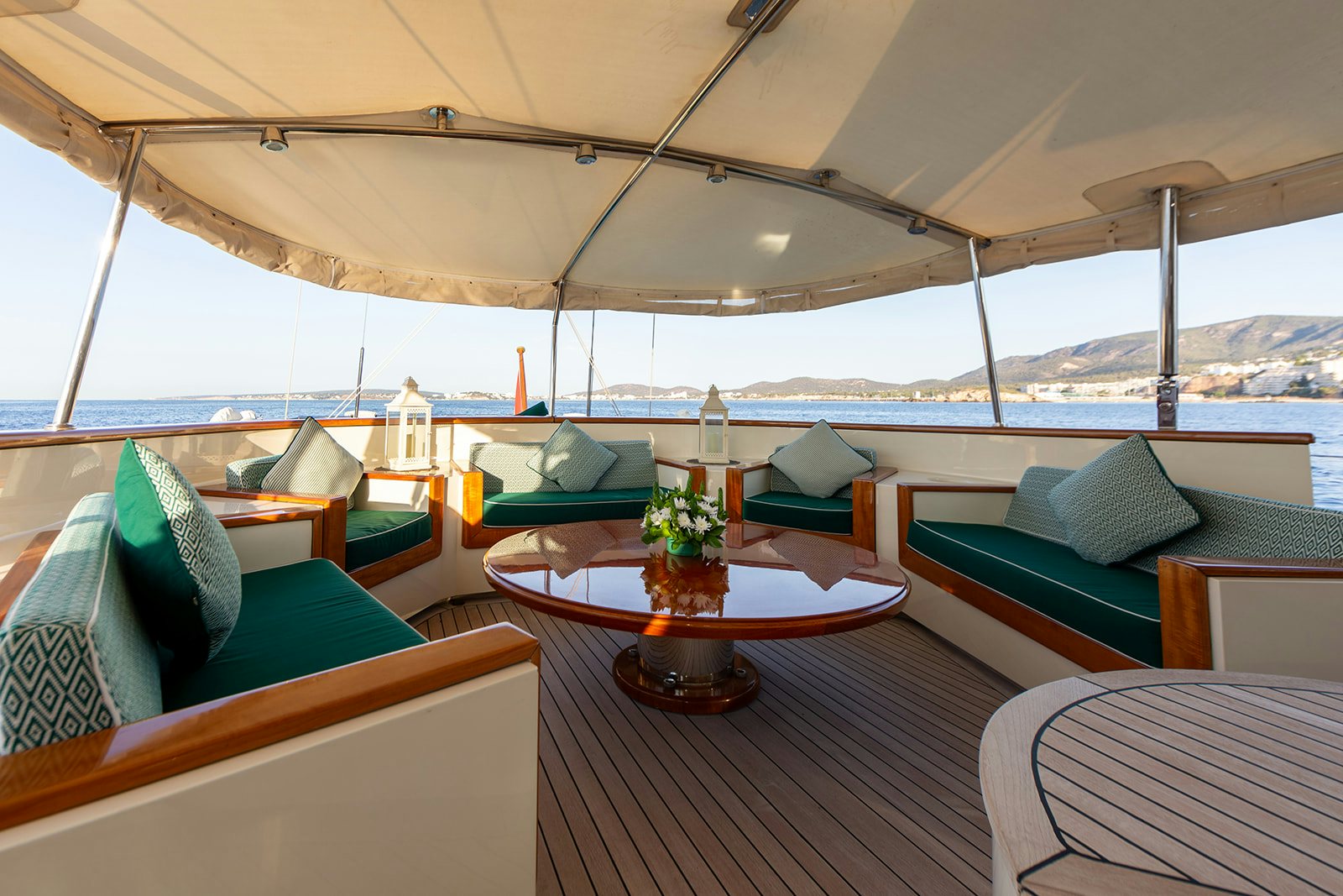 a room with a table and chairs aboard NORFOLK STAR Yacht for Sale