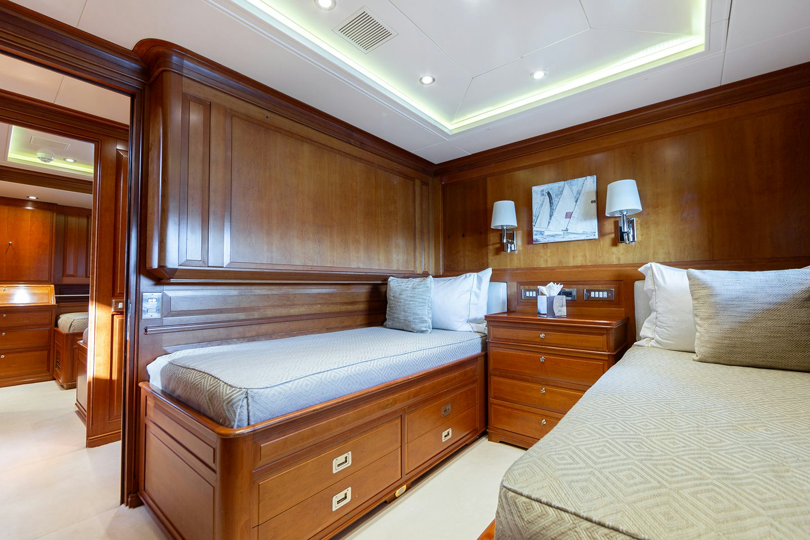 a room with a bed and a desk aboard NORFOLK STAR Yacht for Sale