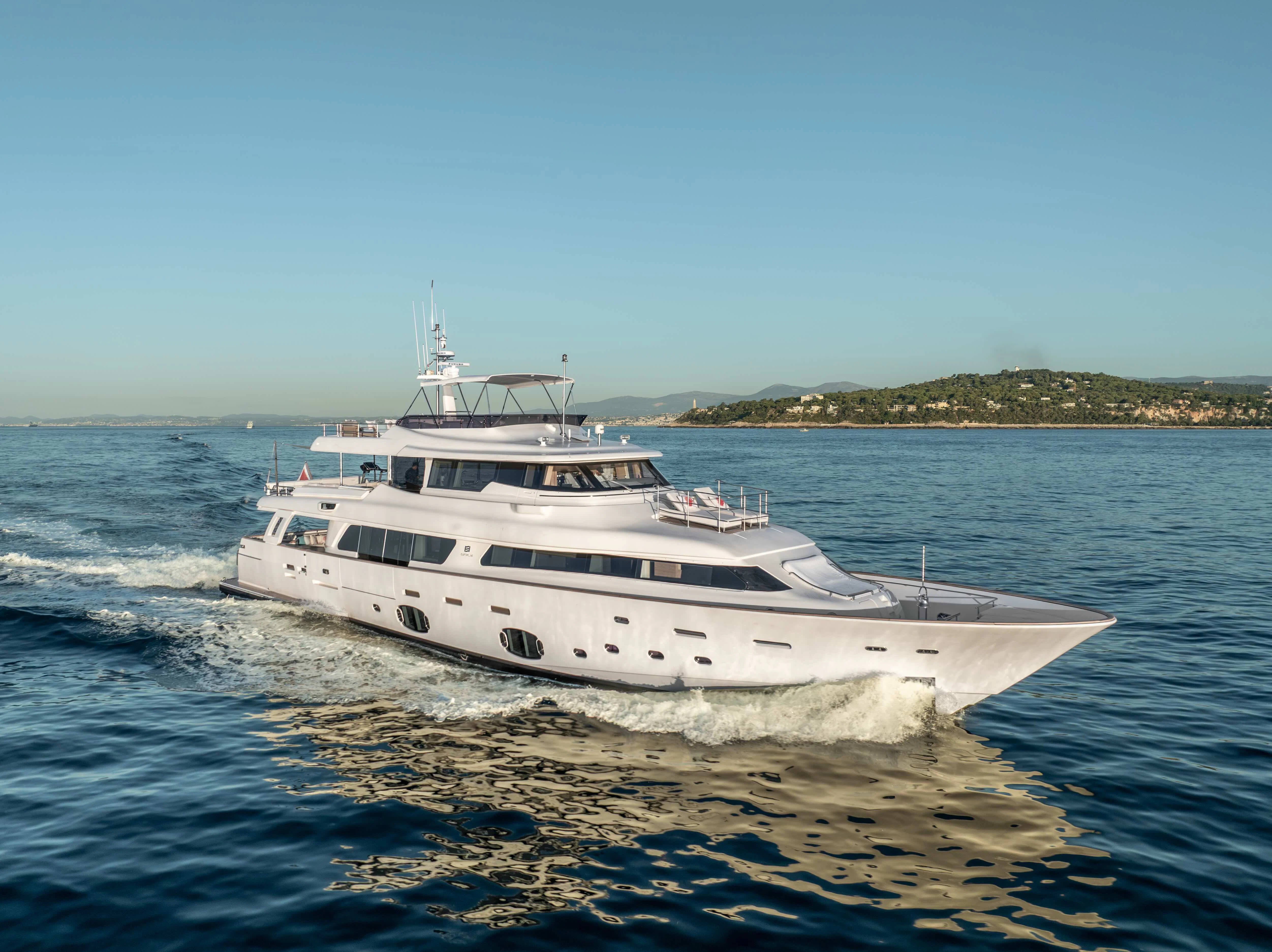 a white yacht on the water aboard CENTURION Yacht for Sale