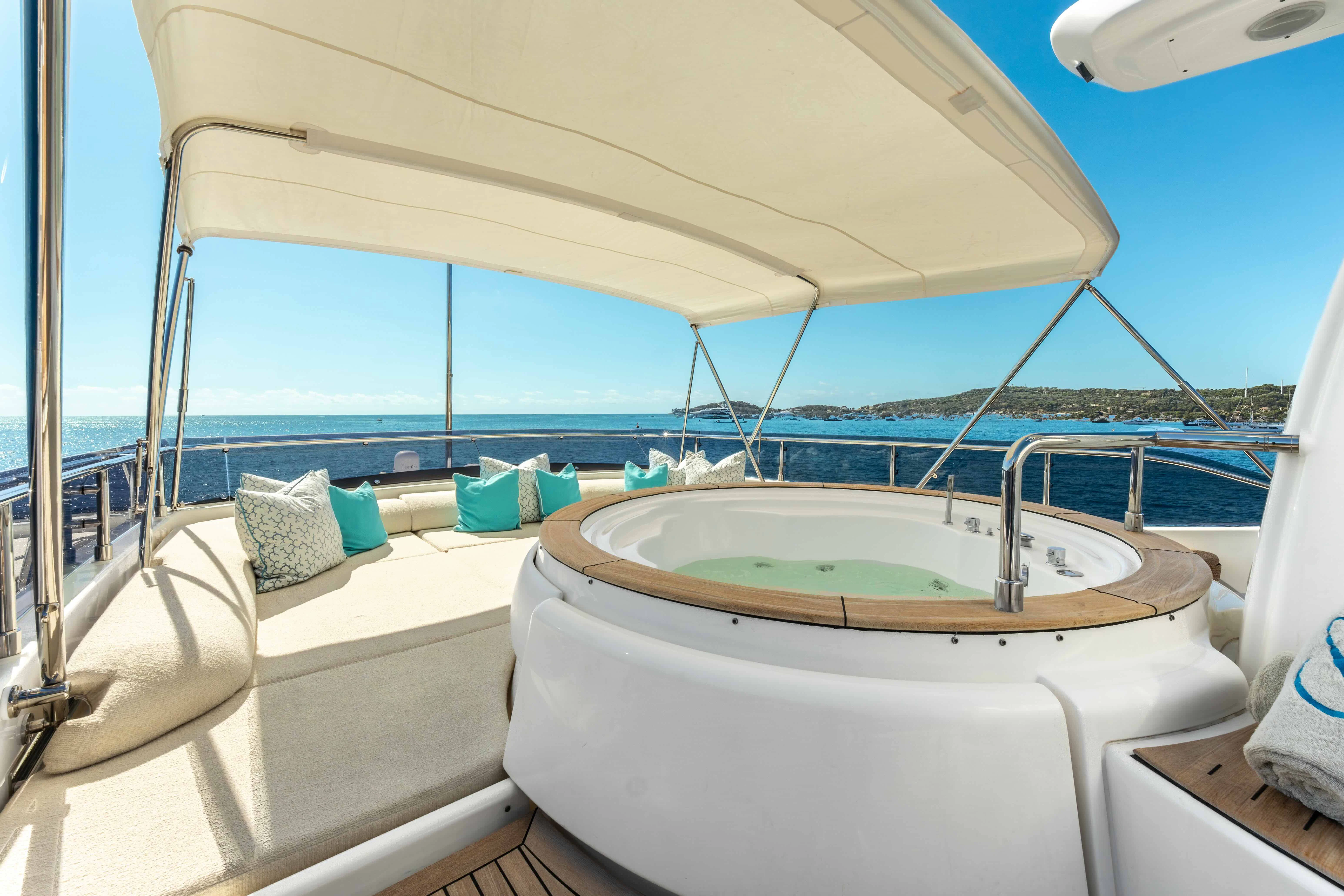 a bathtub with a sink on it aboard CENTURION Yacht for Sale
