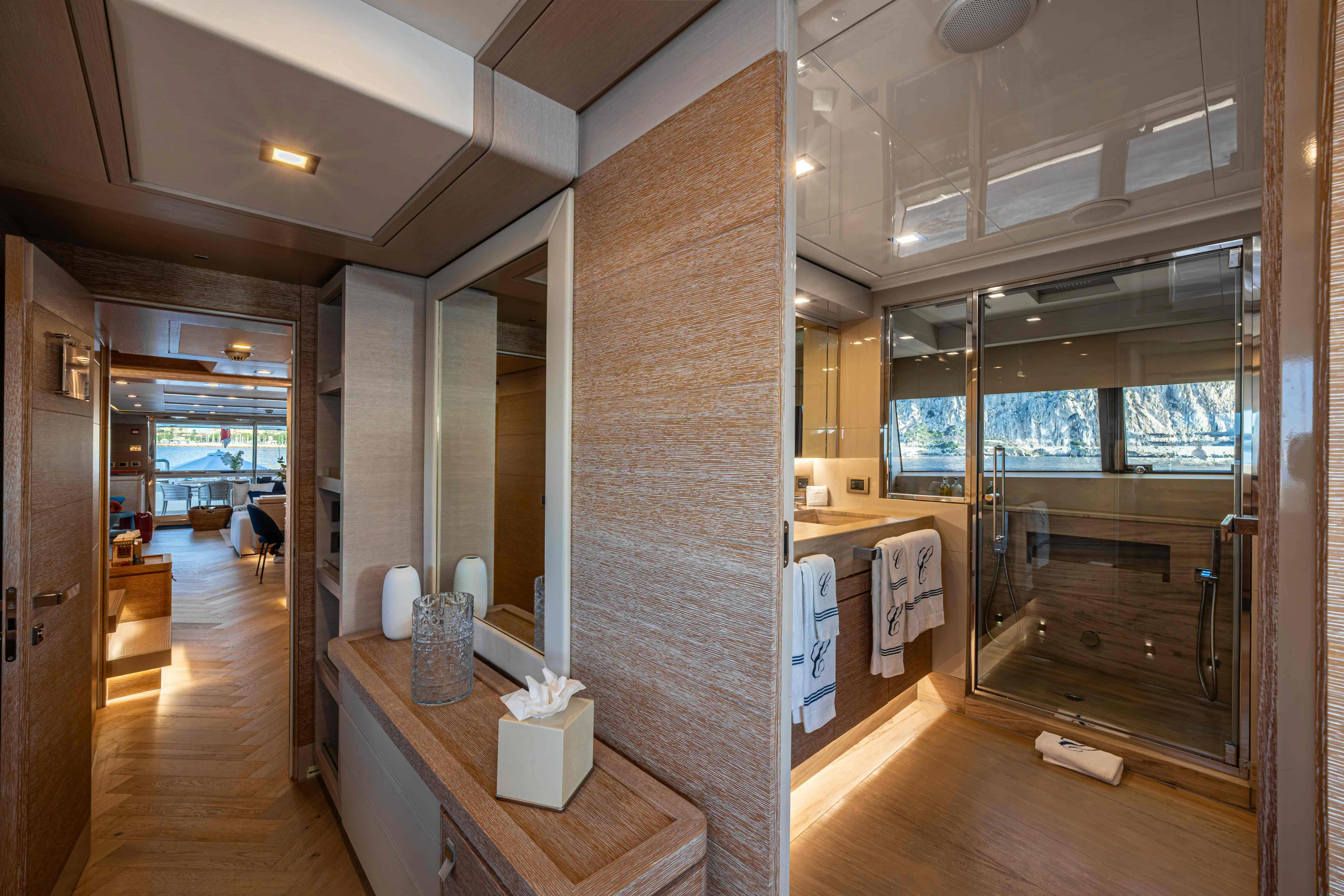 a bathroom with a large mirror aboard CENTURION Yacht for Sale