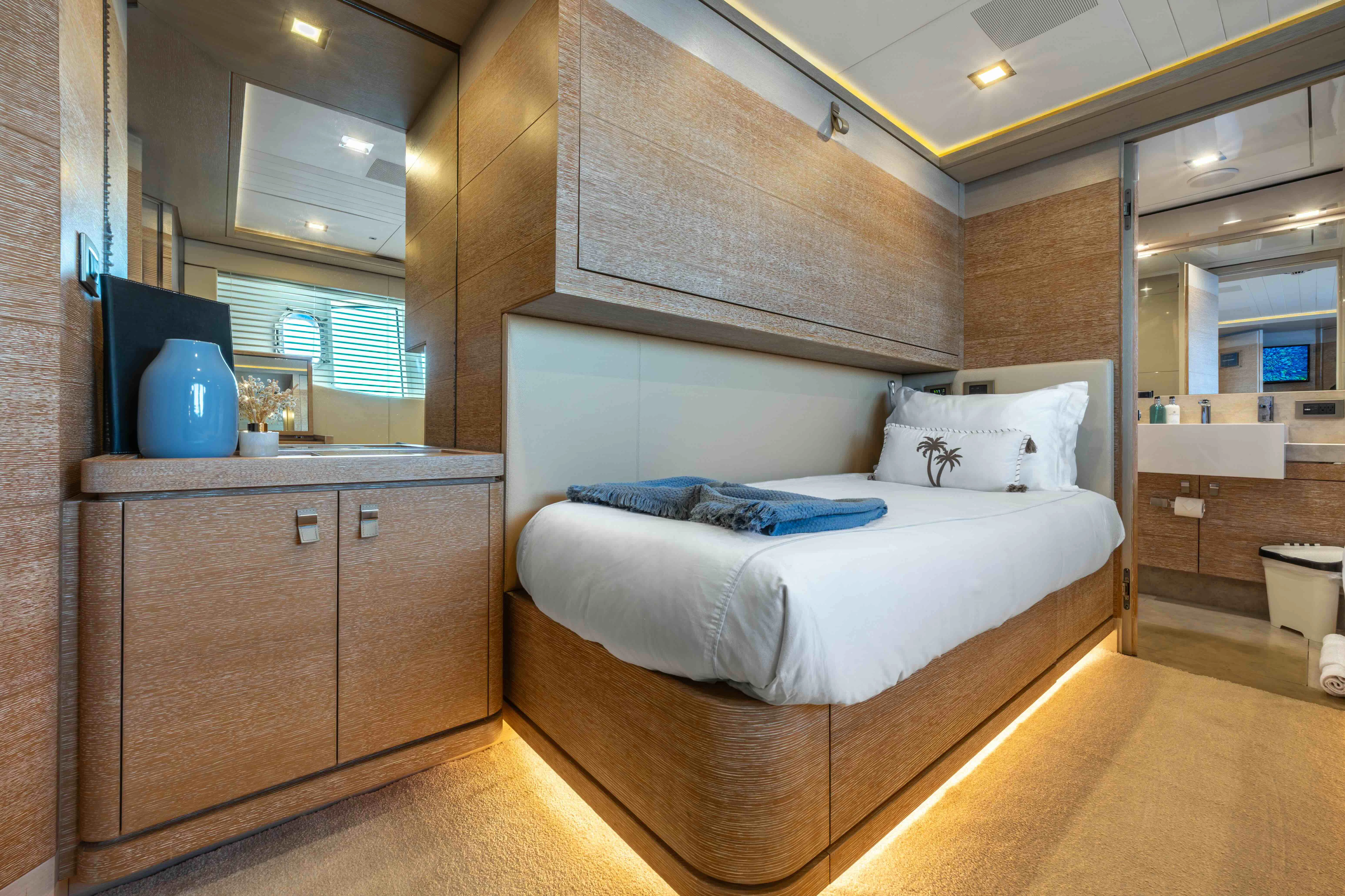 a bedroom with a bed aboard CENTURION Yacht for Sale