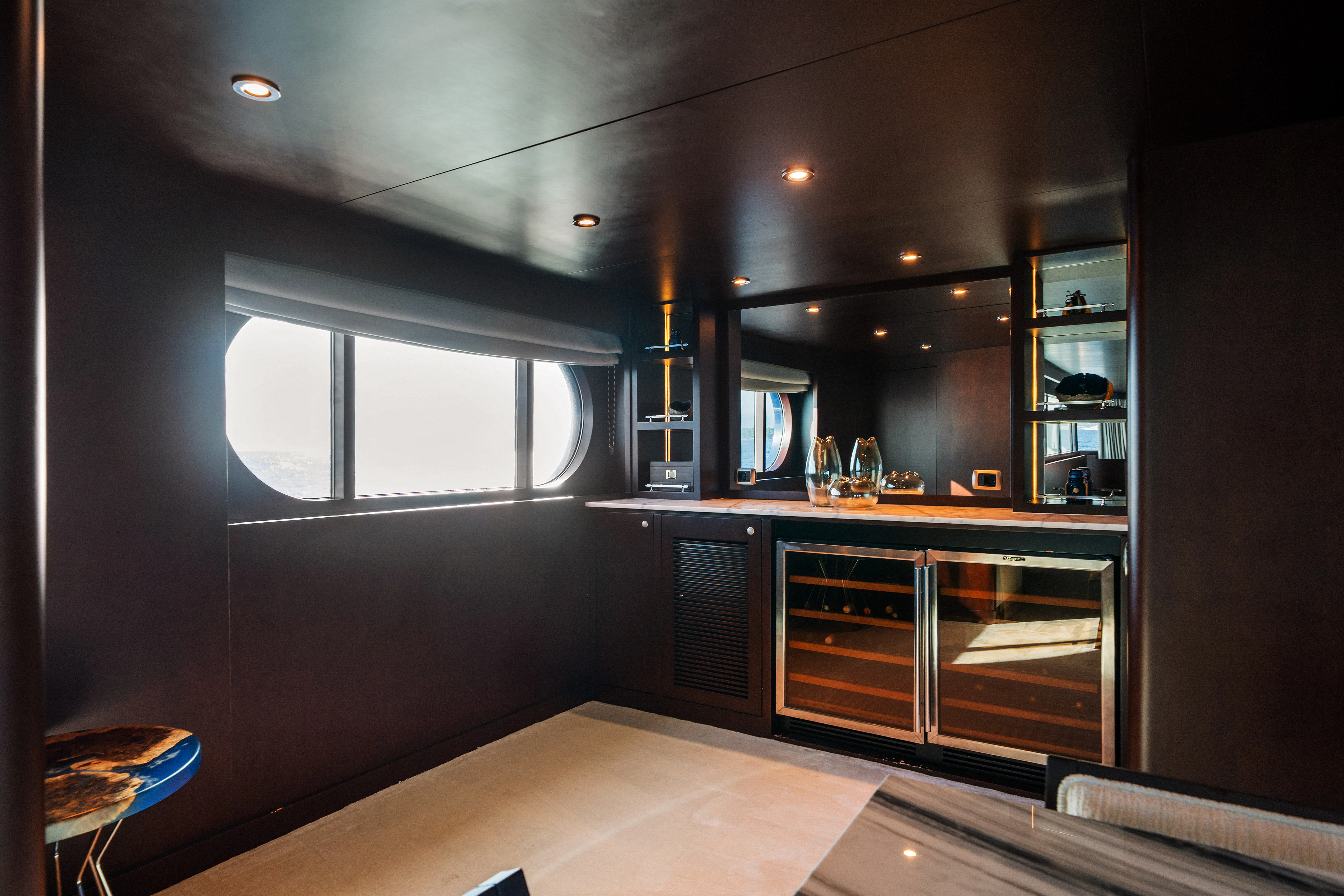 a kitchen with a large window aboard KORU Yacht for Sale