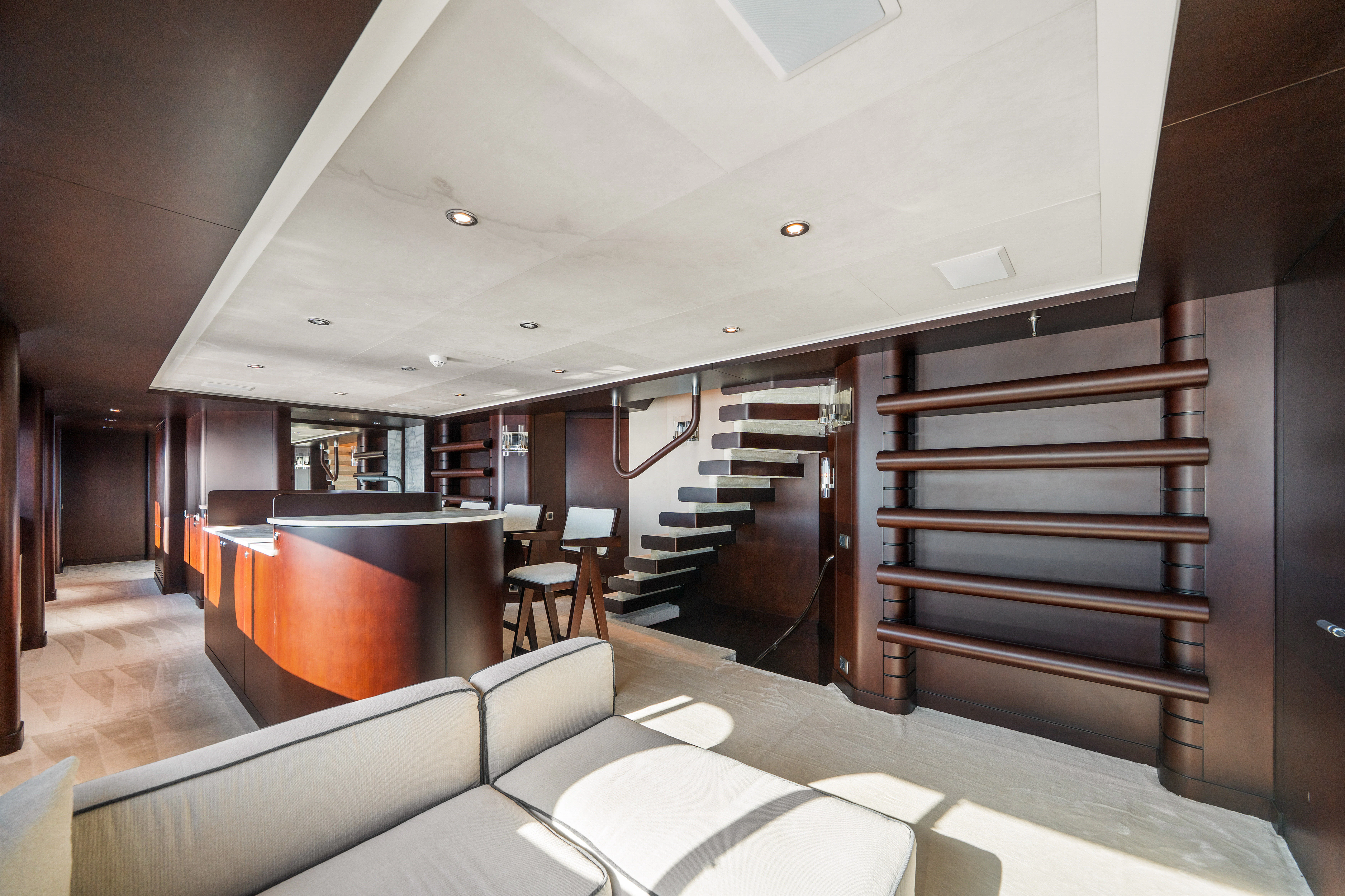 a modern looking living room aboard KORU Yacht for Sale