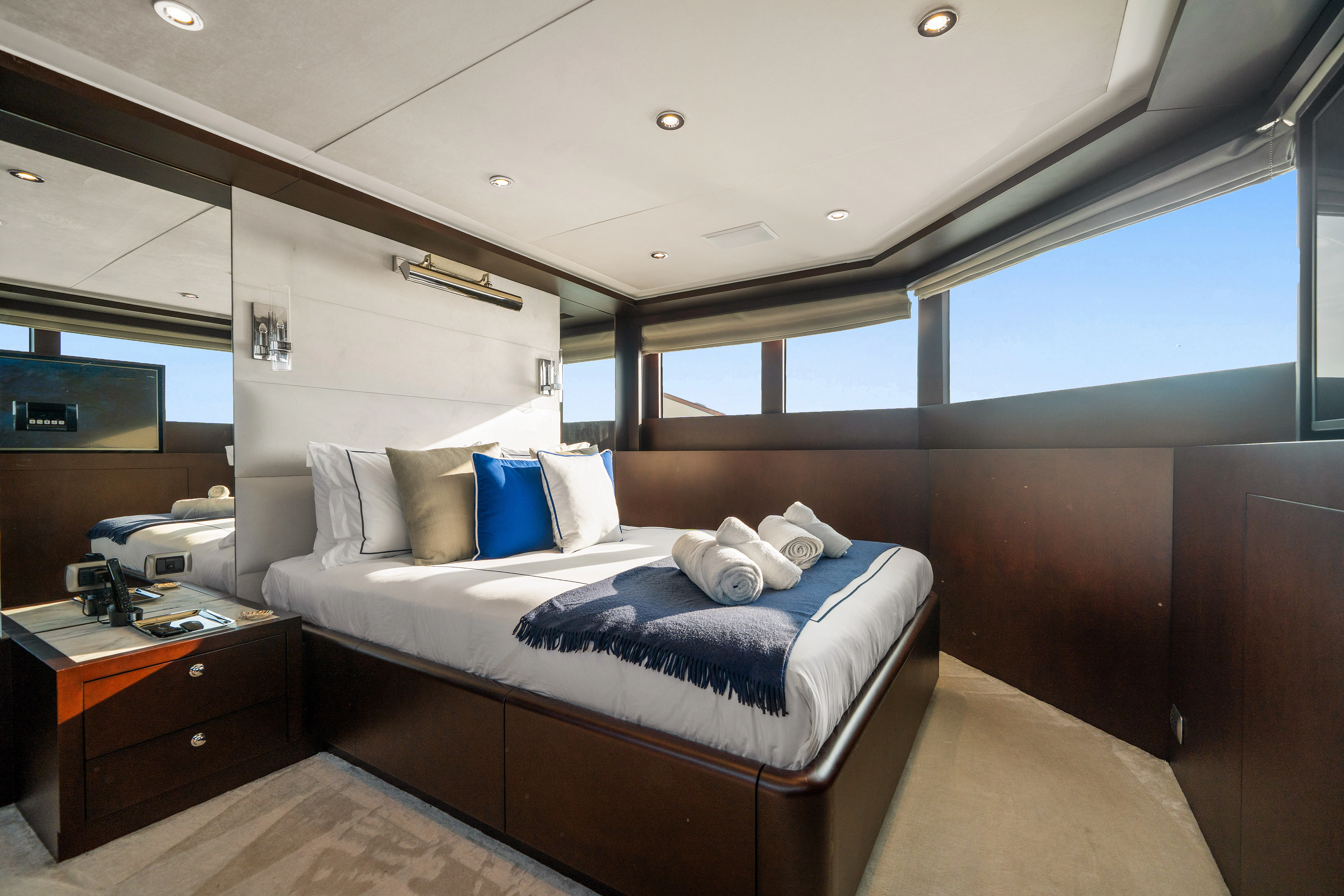 a bed in a room aboard KORU Yacht for Sale