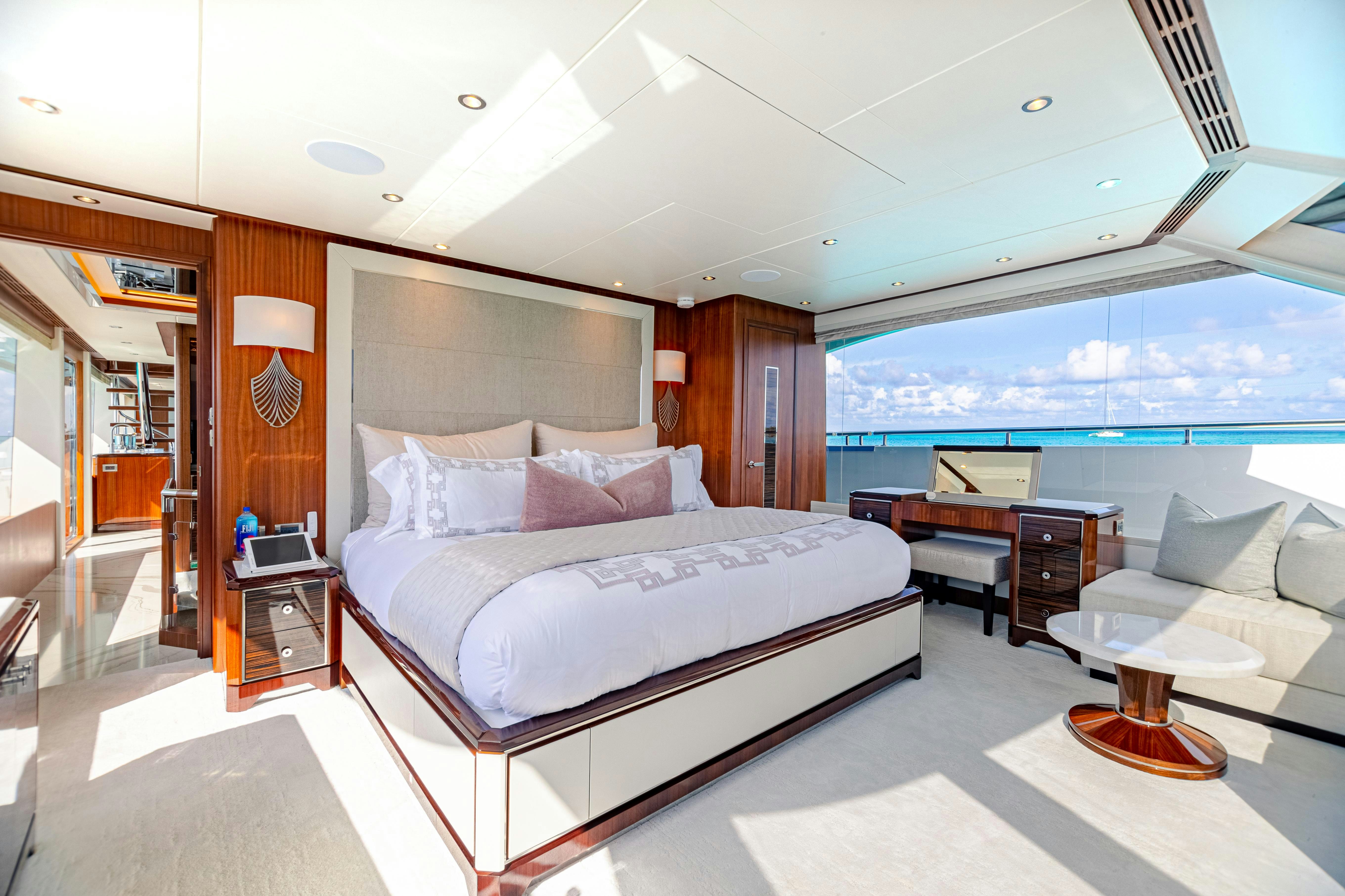 a large bed in a room aboard I C Yacht for Charter