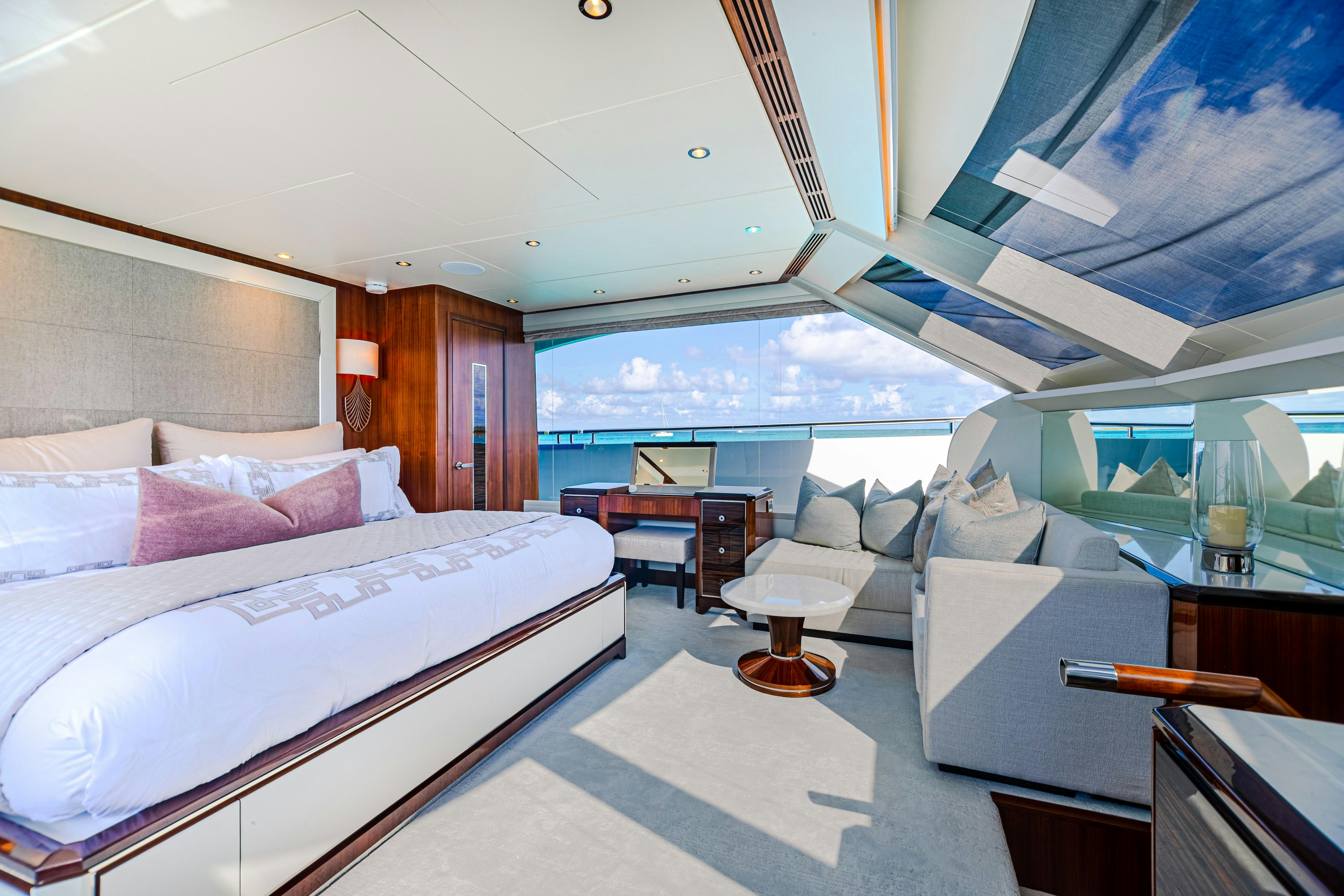 a room with a bed and a window aboard I C Yacht for Charter