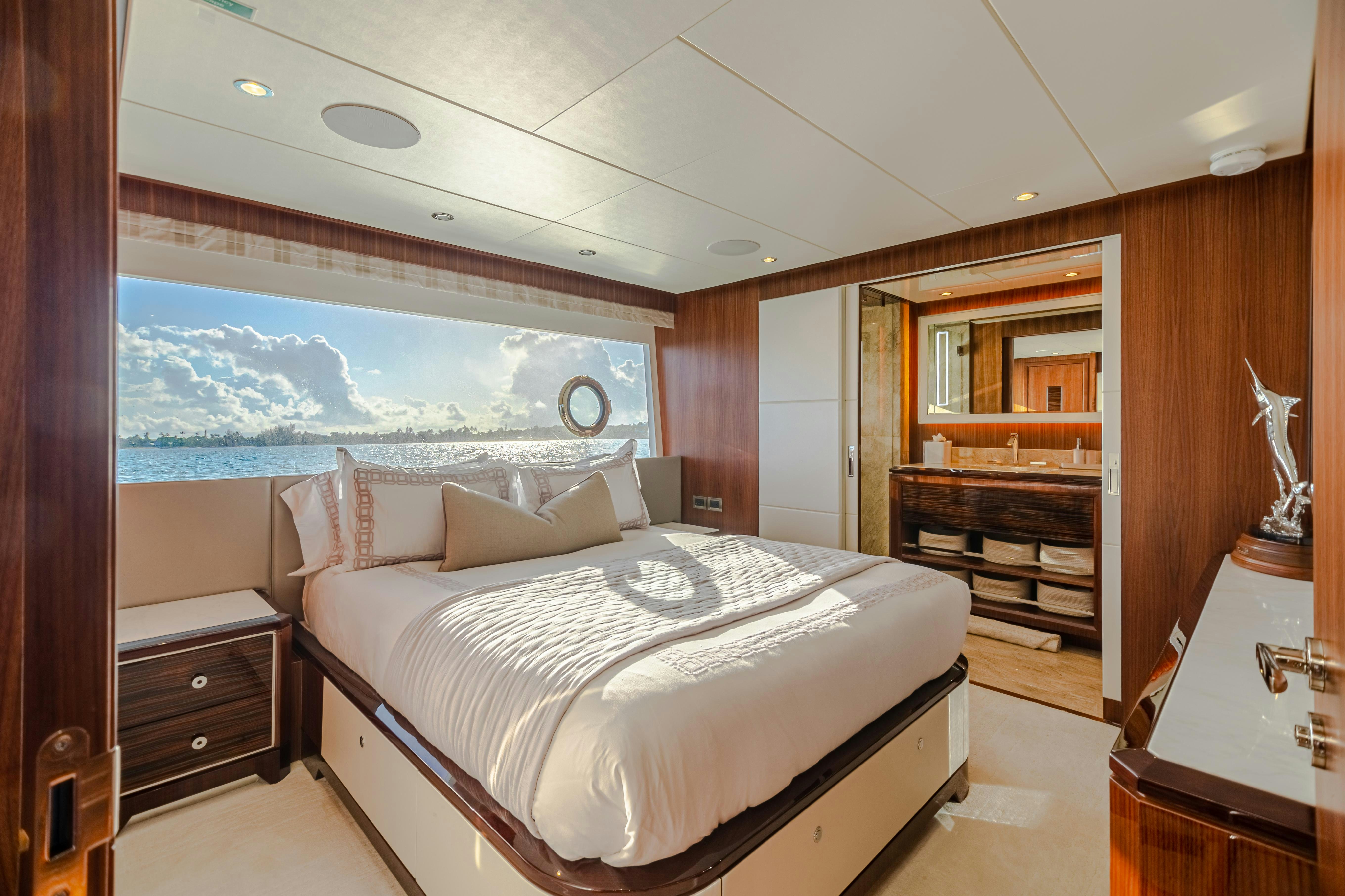 a bedroom with a large bed aboard I C Yacht for Charter