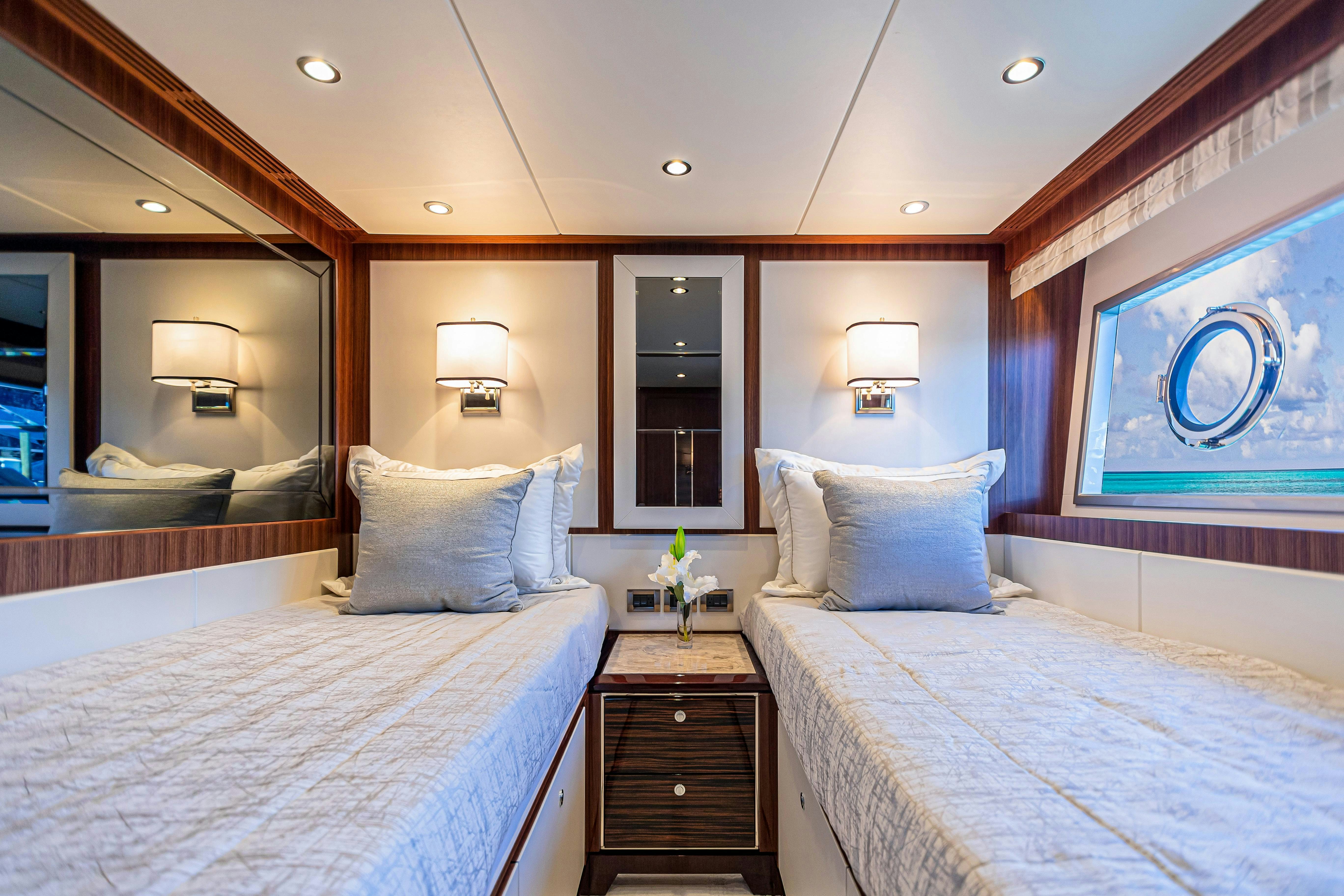 a room with two beds aboard I C Yacht for Charter