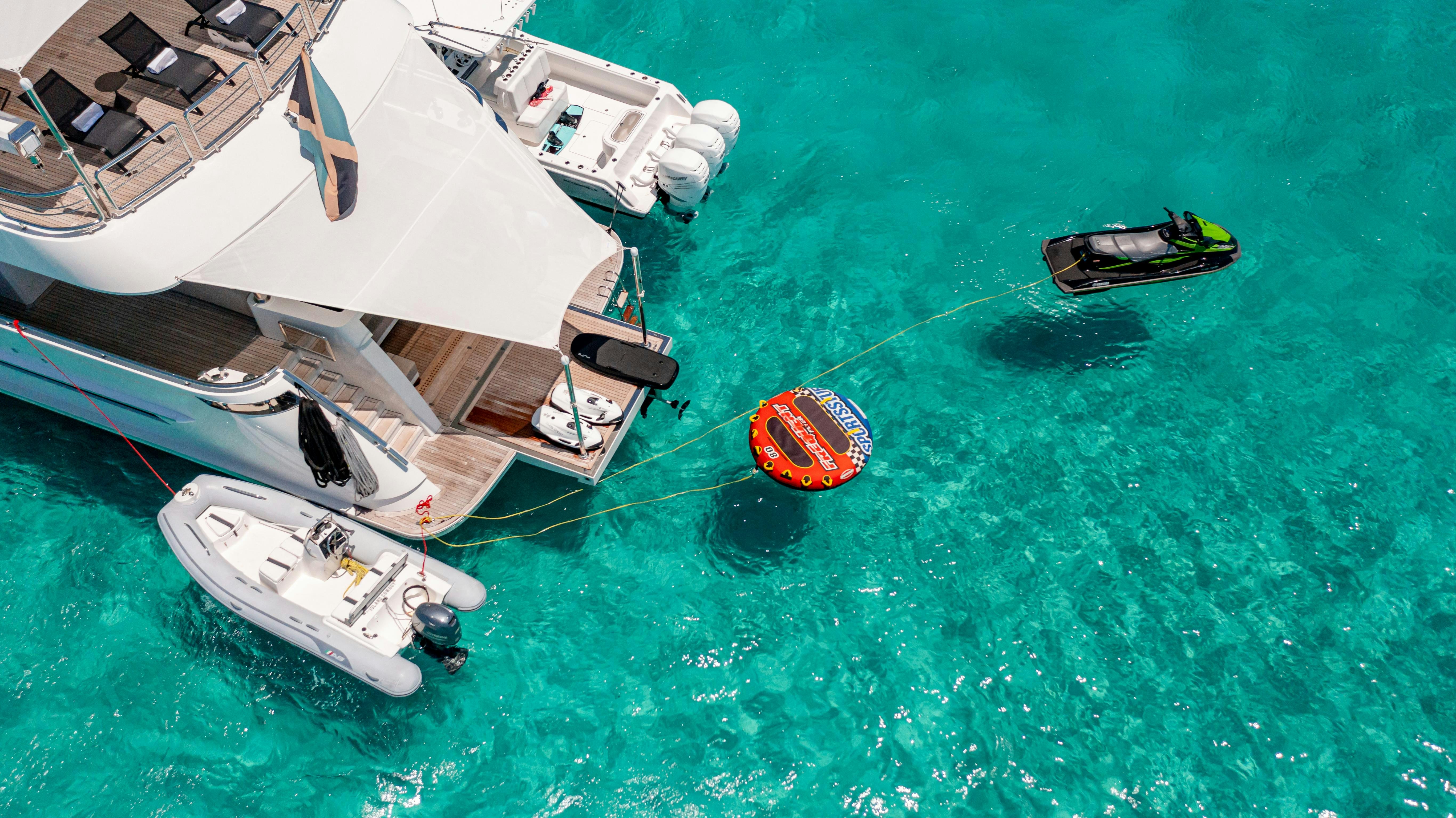 a boat and a boat in the water aboard I C Yacht for Charter