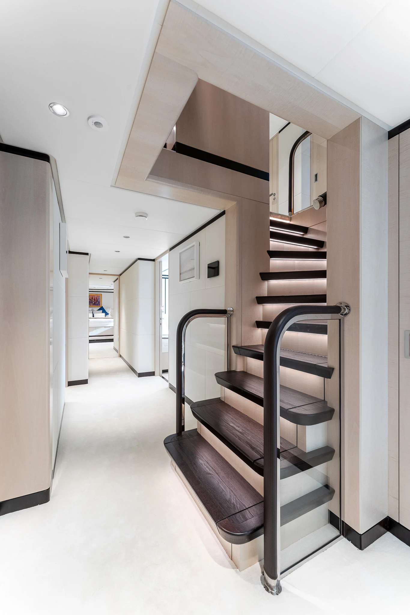 a long staircase in a building aboard OPTIMISM Yacht for Sale