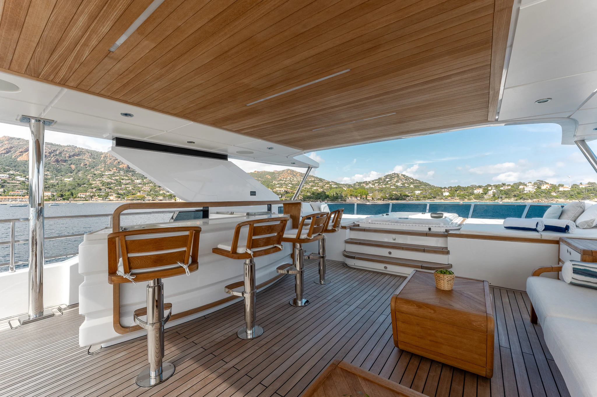 a room with tables and chairs aboard OPTIMISM Yacht for Sale