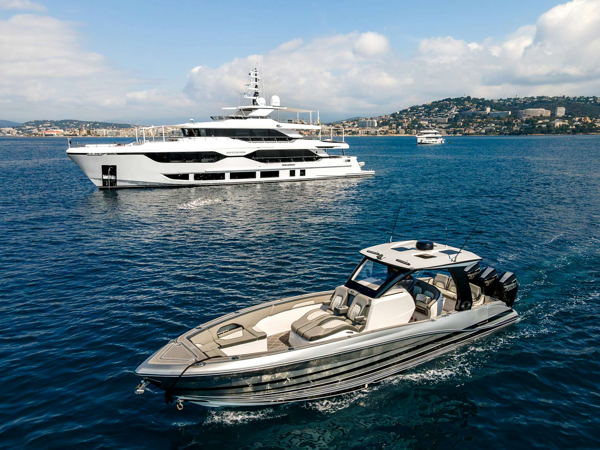 a couple of boats in the water aboard OPTIMISM Yacht for Charter