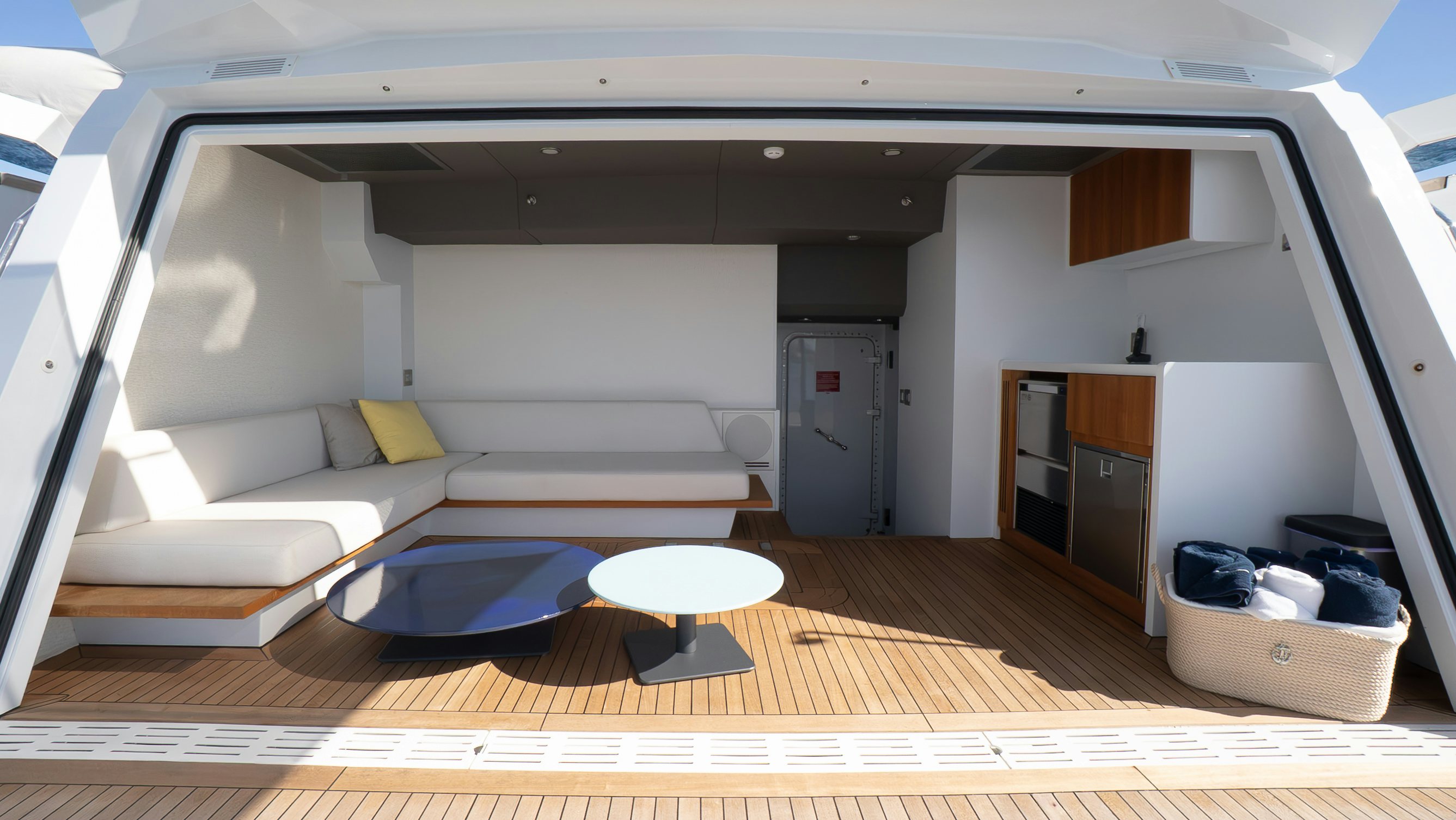 a room with a couch and a table aboard RAY Yacht for Sale