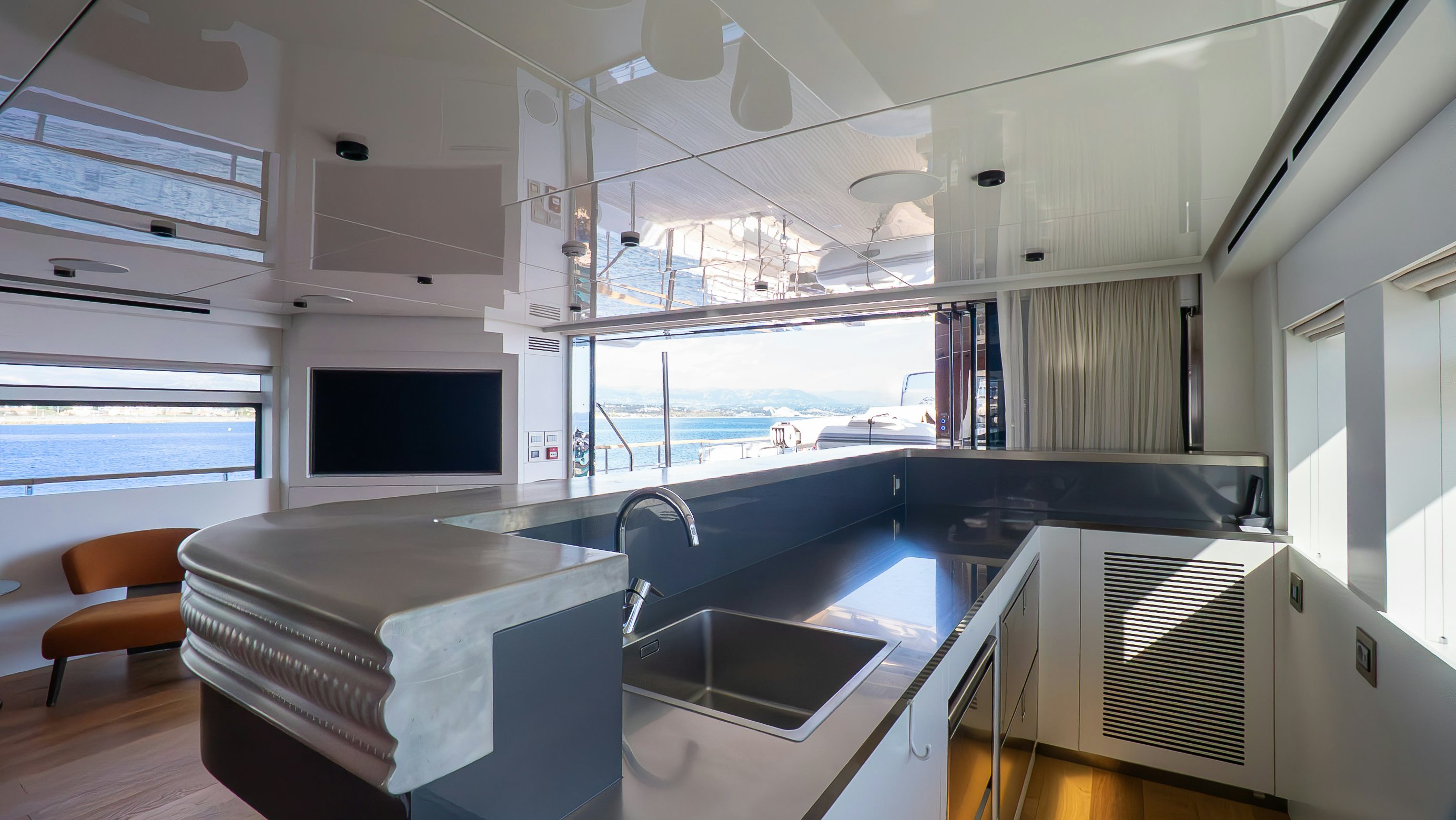 a room with a large window and a large sink aboard RAY Yacht for Sale