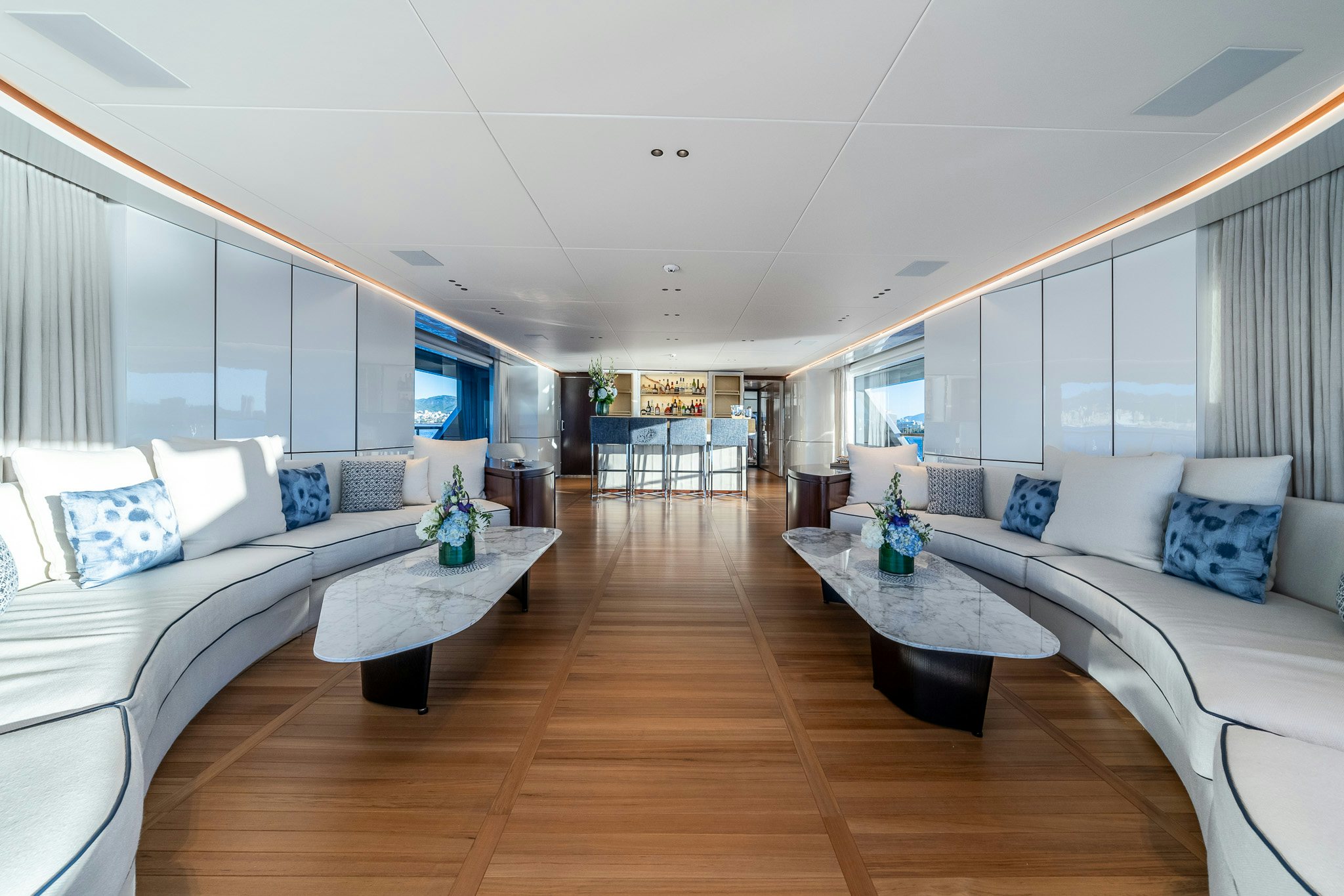 a living room with a couch and a table aboard ALPHA WAVES Yacht for Charter