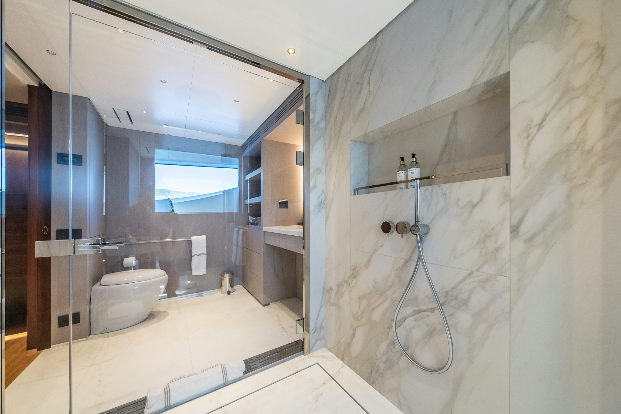 a bathroom with a large mirror aboard ALPHA WAVES Yacht for Charter