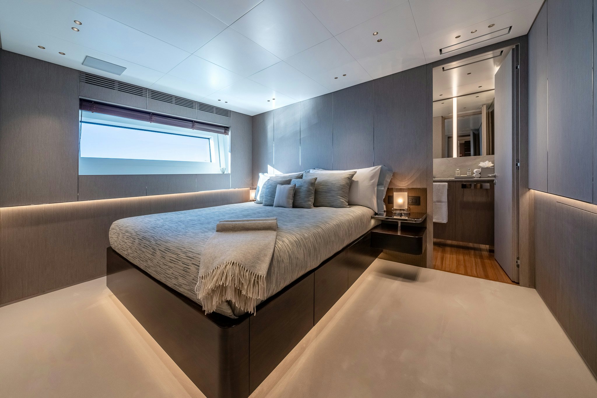 a bed in a room aboard ALPHA WAVES Yacht for Charter