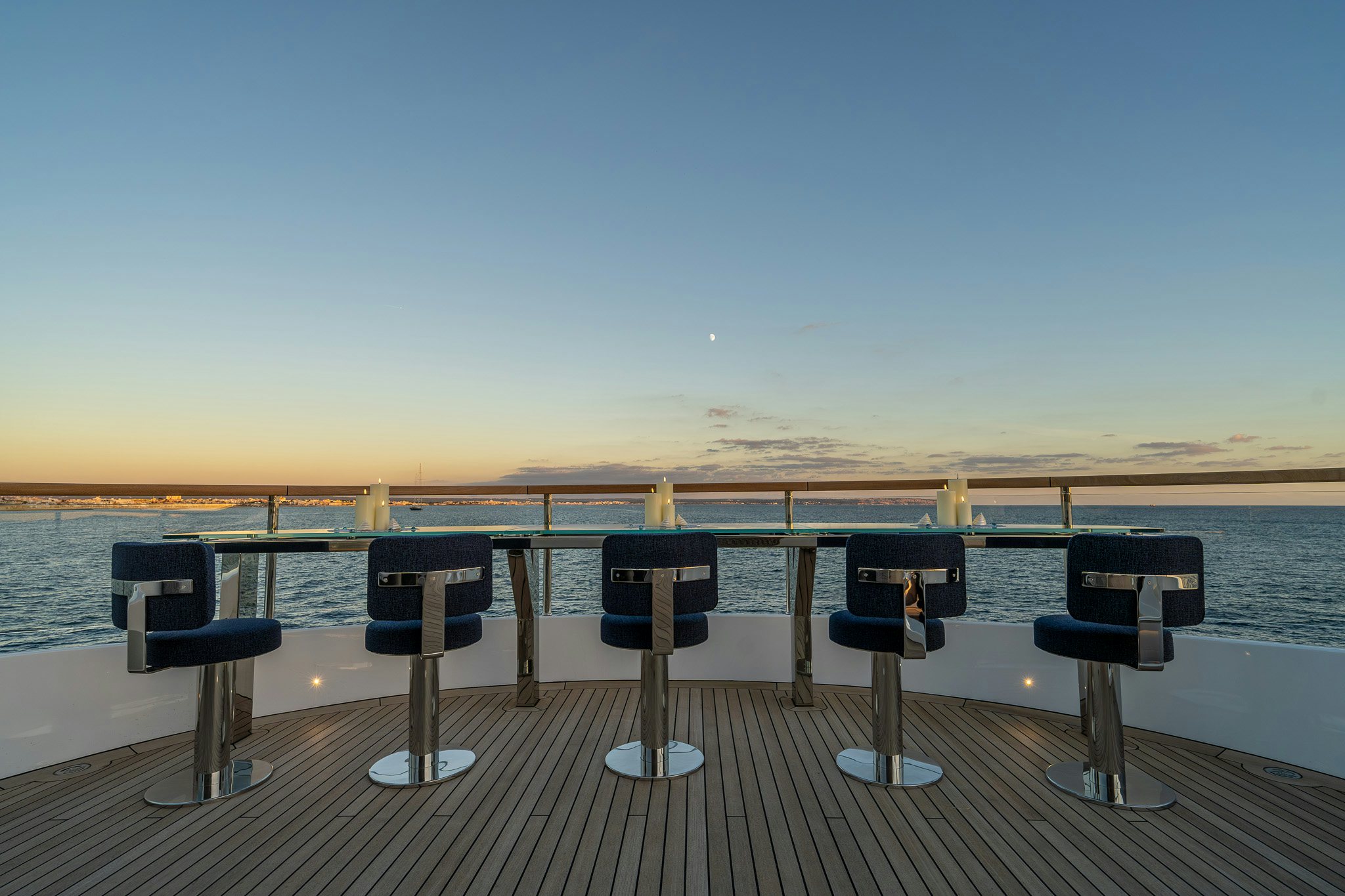 a dock with chairs on it aboard ALPHA WAVES Yacht for Charter
