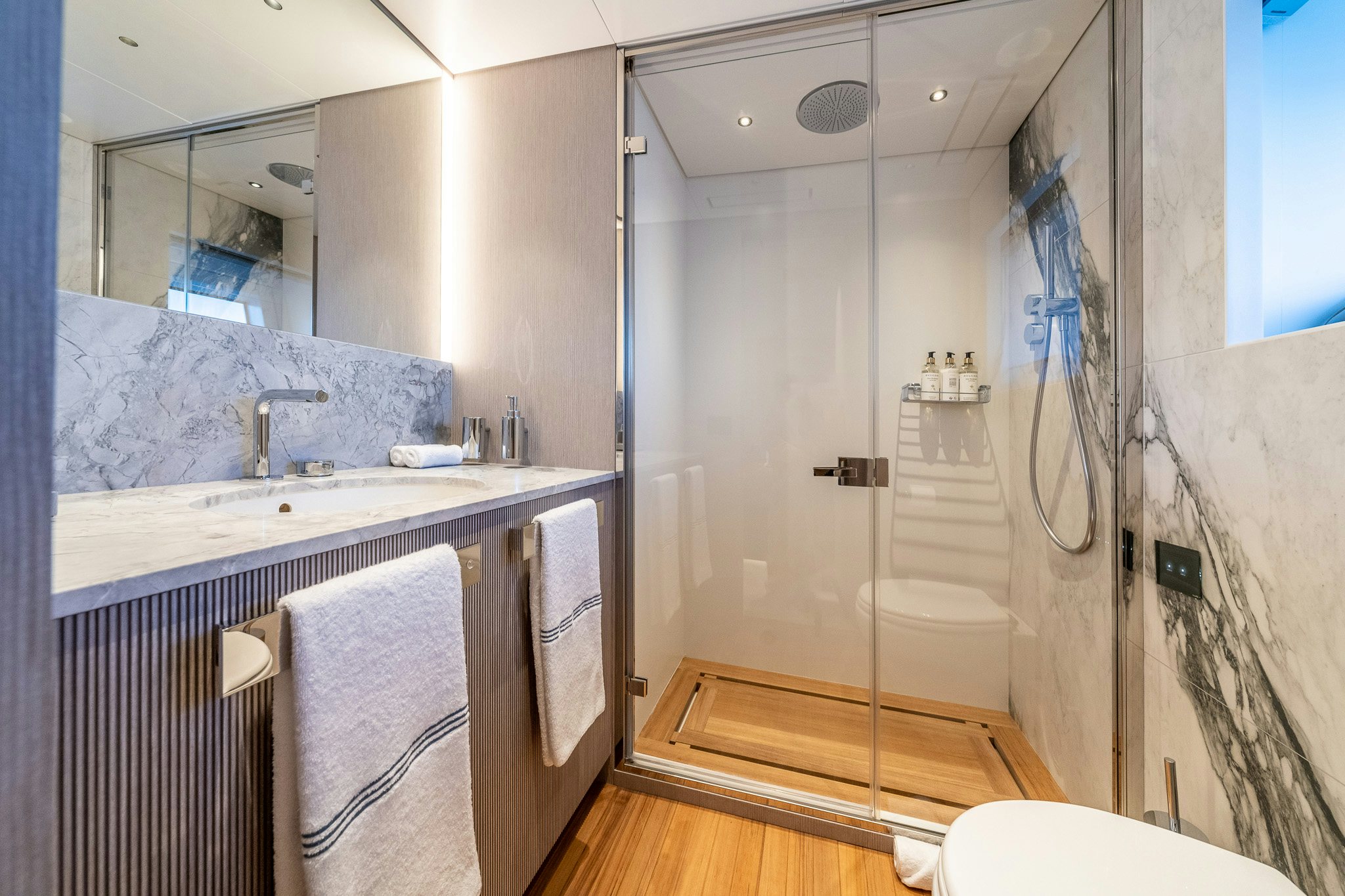 a bathroom with a shower and sink aboard ALPHA WAVES Yacht for Charter
