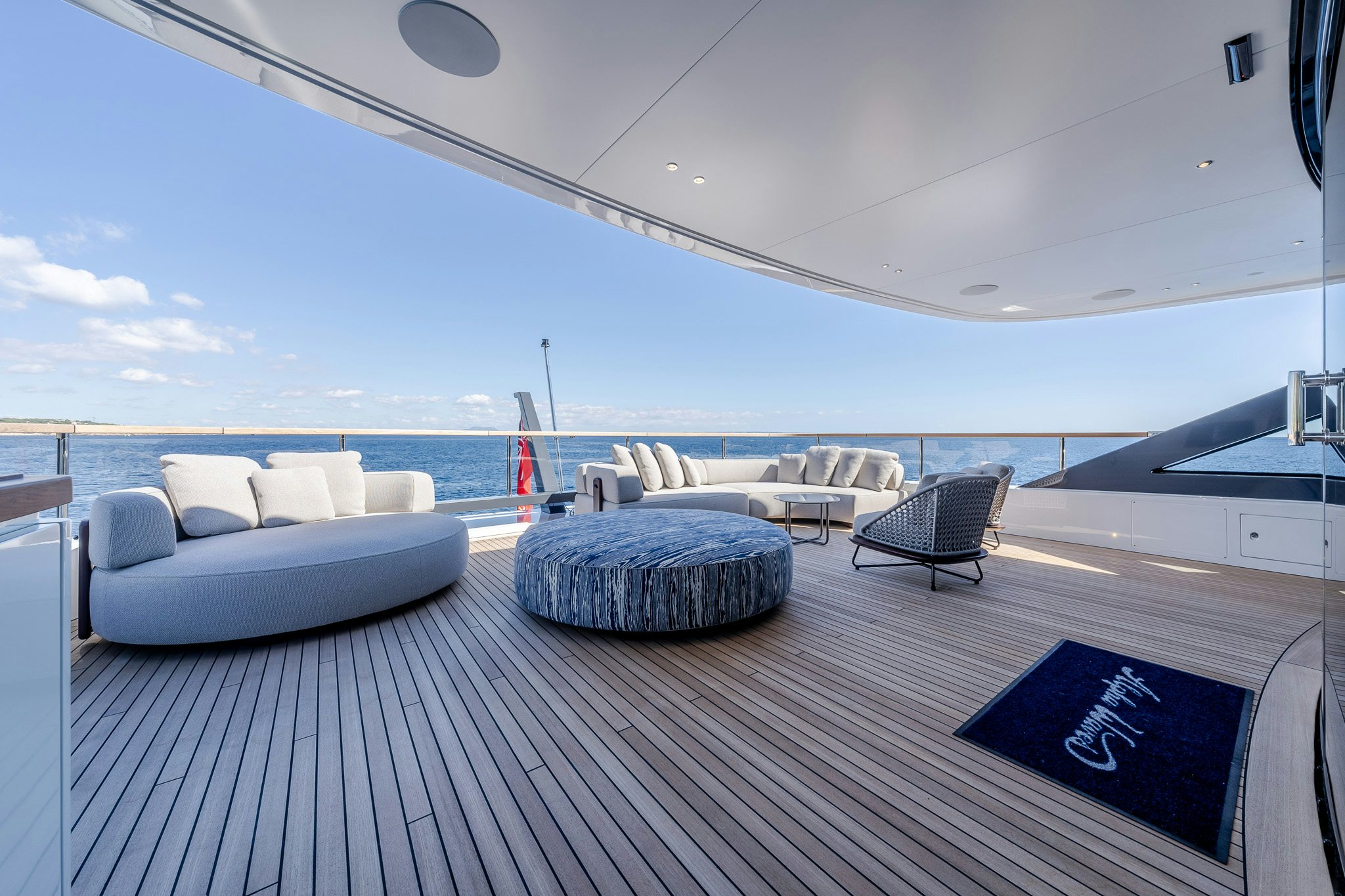 a large balcony overlooking a beach aboard ALPHA WAVES Yacht for Charter
