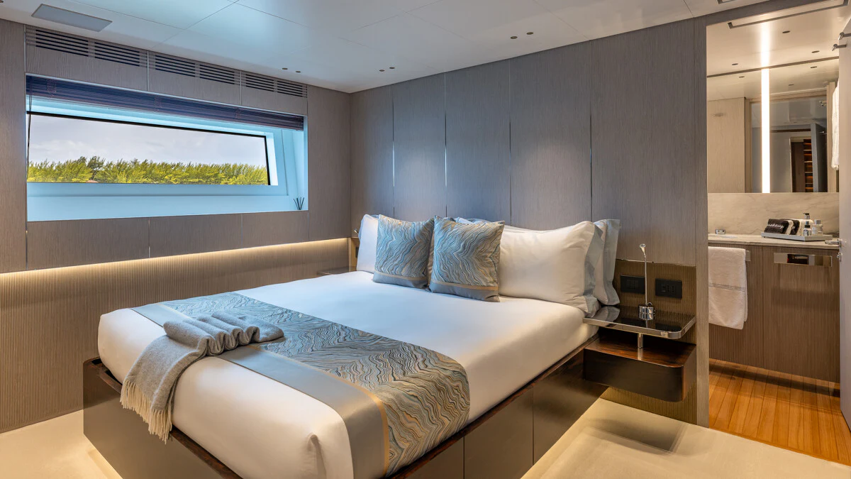 a bed in a room aboard ALPHA WAVES Yacht for Charter
