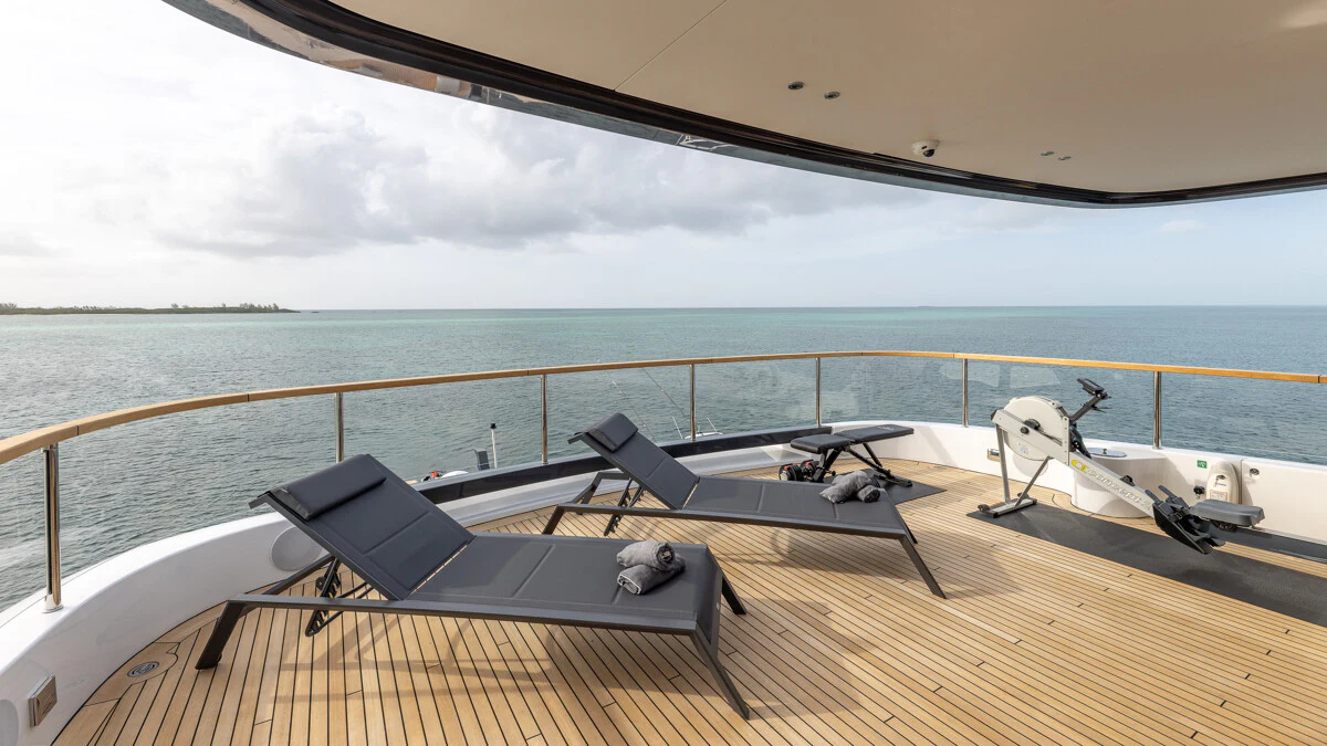 a deck with a boat on it aboard ALPHA WAVES Yacht for Charter