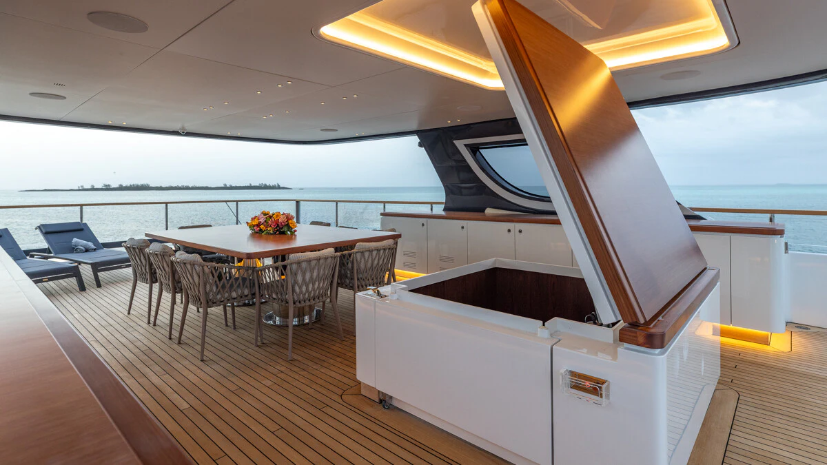 a room with a table and chairs aboard ALPHA WAVES Yacht for Charter