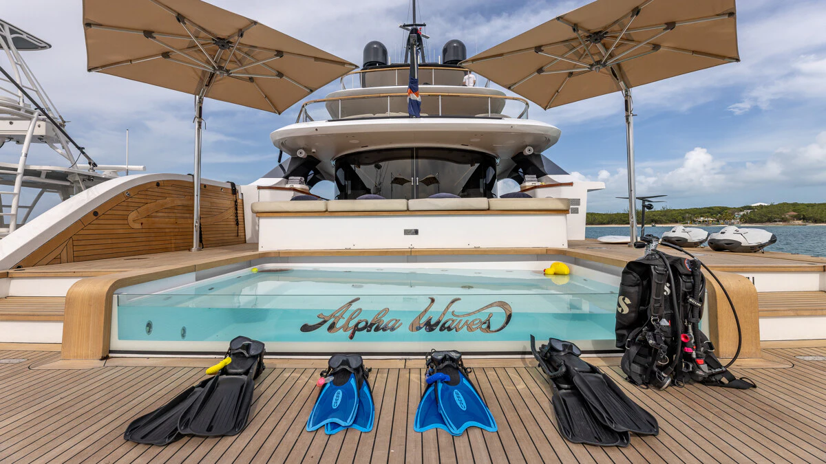 a boat with luggage on a deck aboard ALPHA WAVES Yacht for Charter