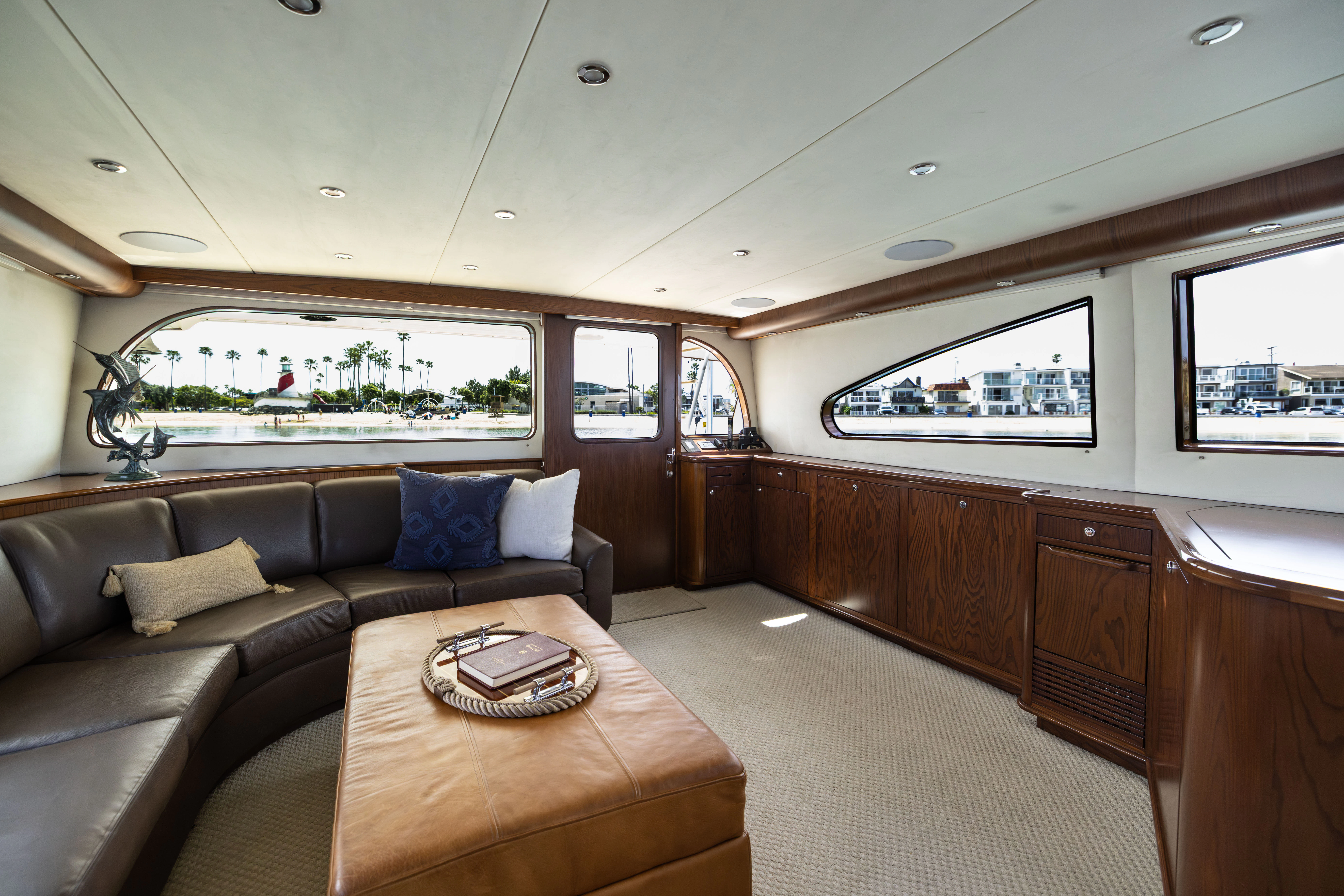 a large room with a couch and a table aboard VERTIGO Yacht for Sale