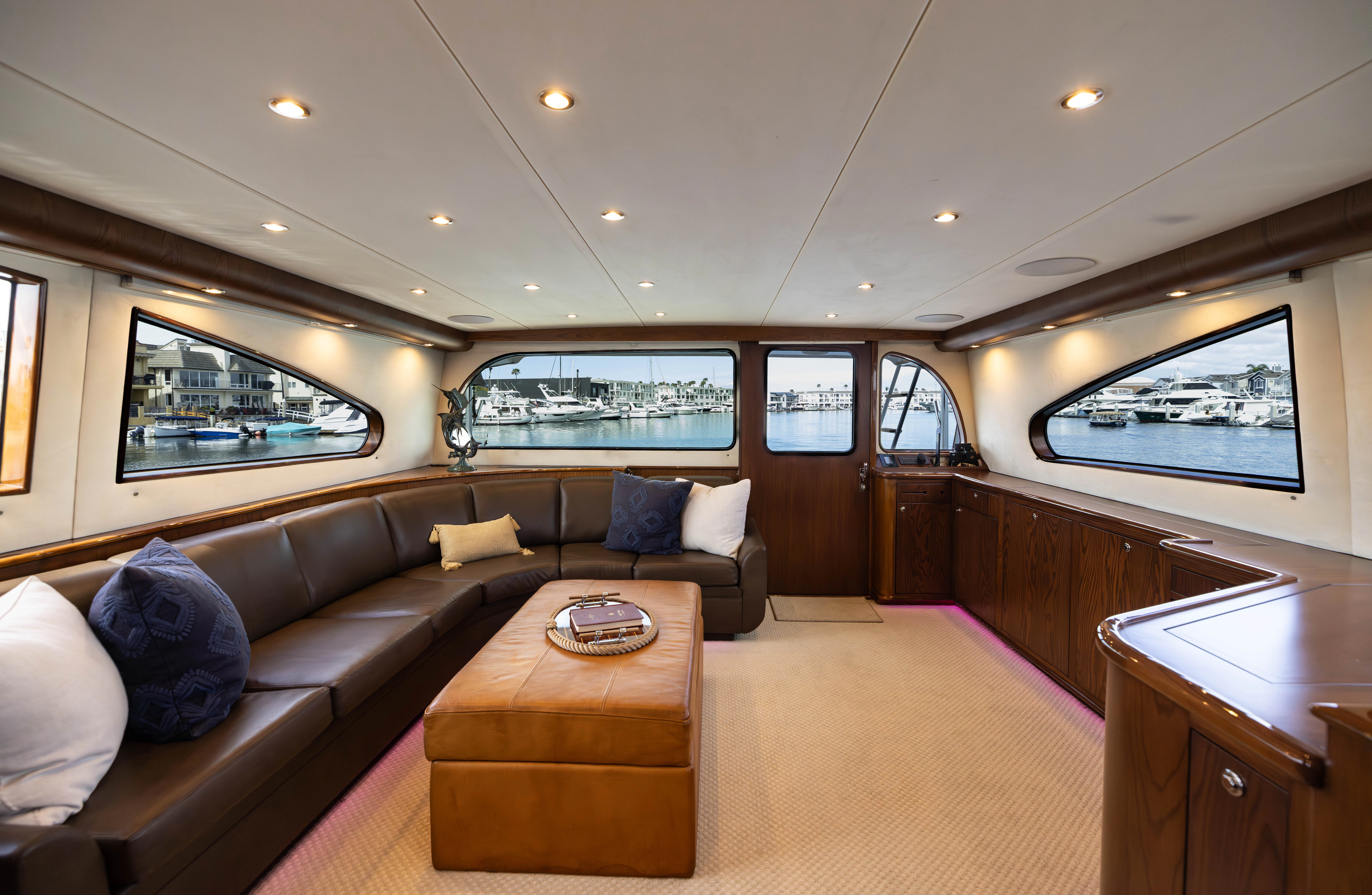 a living room with a couch and a table aboard VERTIGO Yacht for Sale