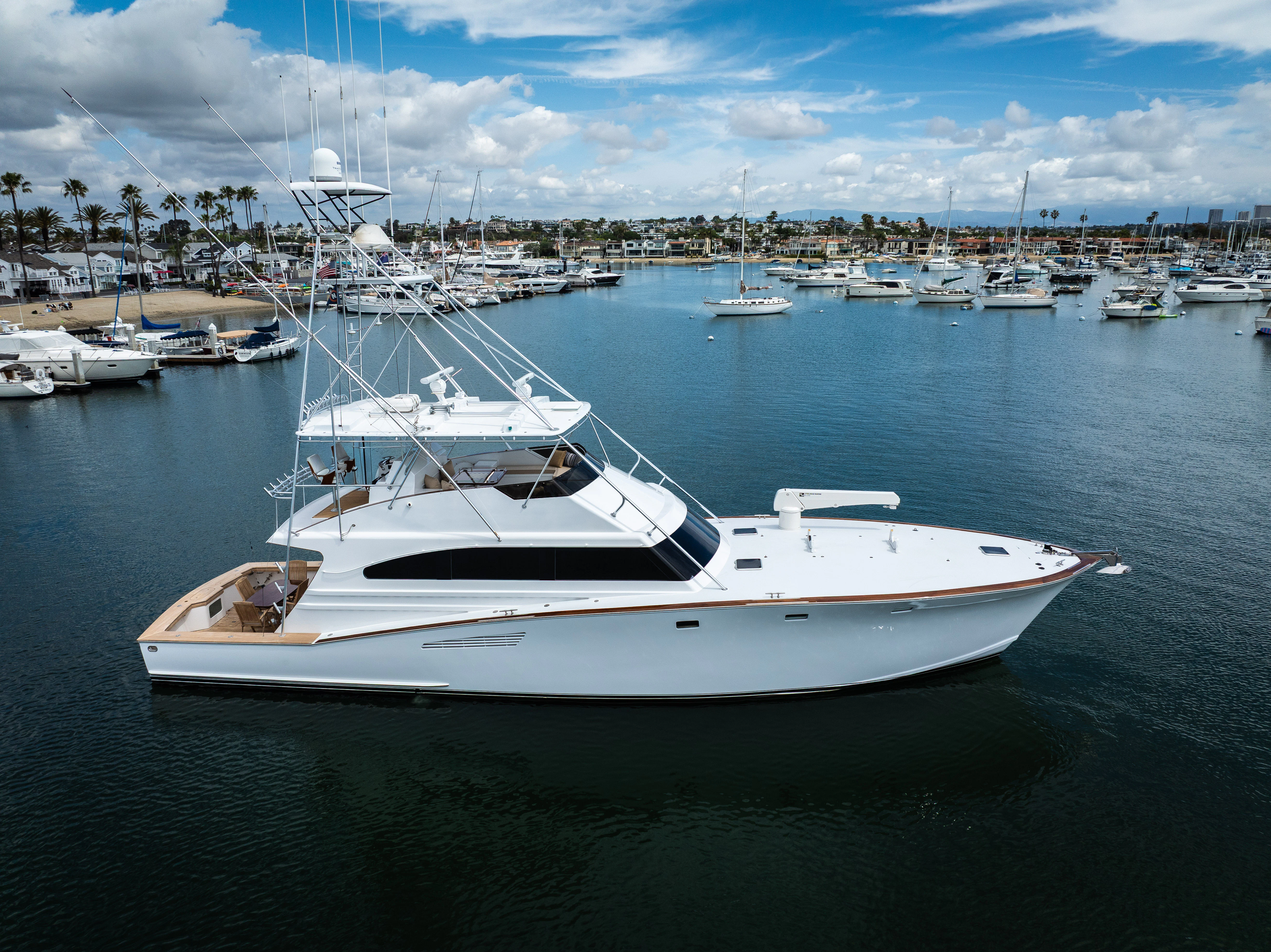 a white yacht in the water aboard VERTIGO Yacht for Sale