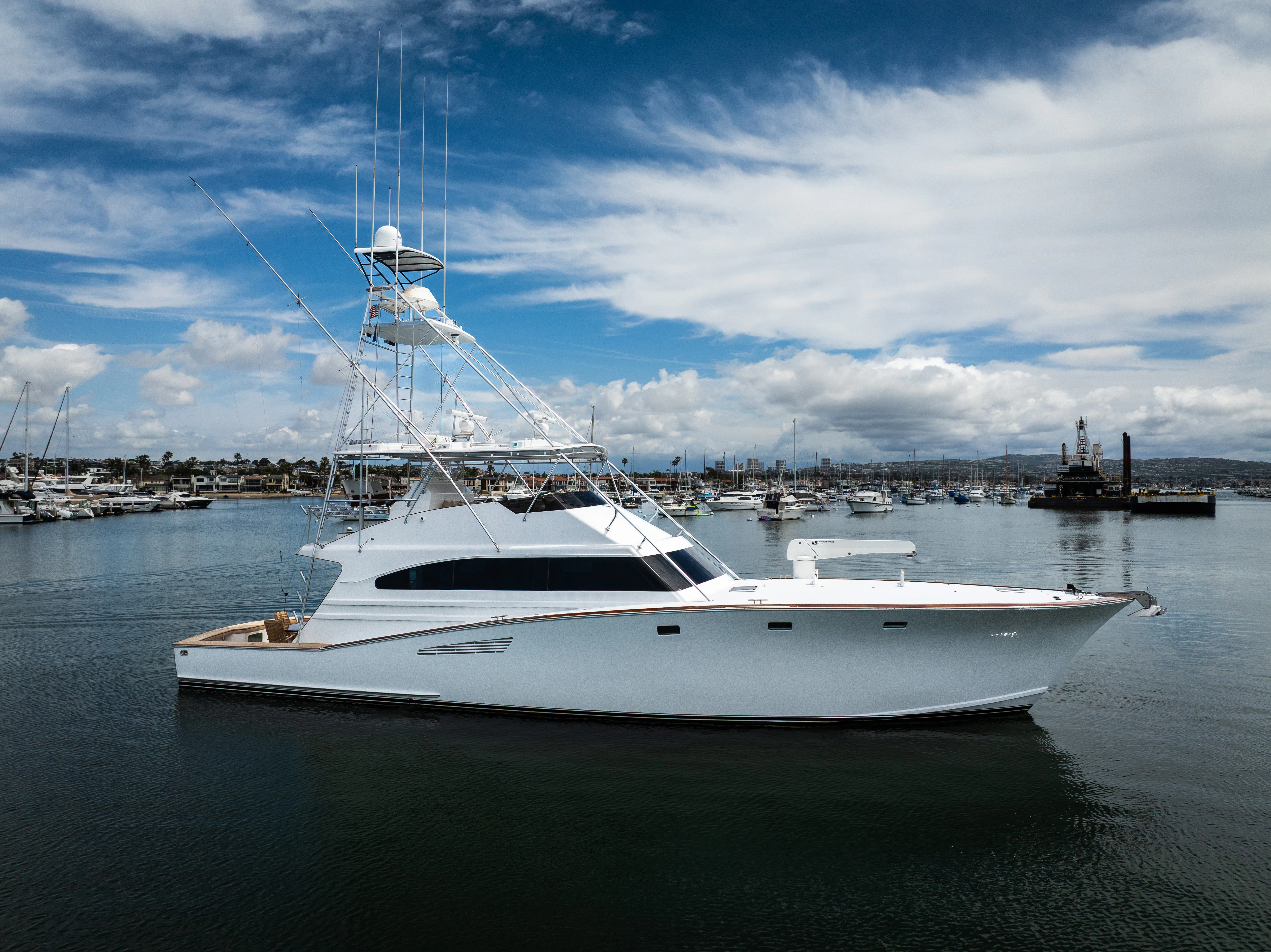 a white boat in the water aboard VERTIGO Yacht for Sale