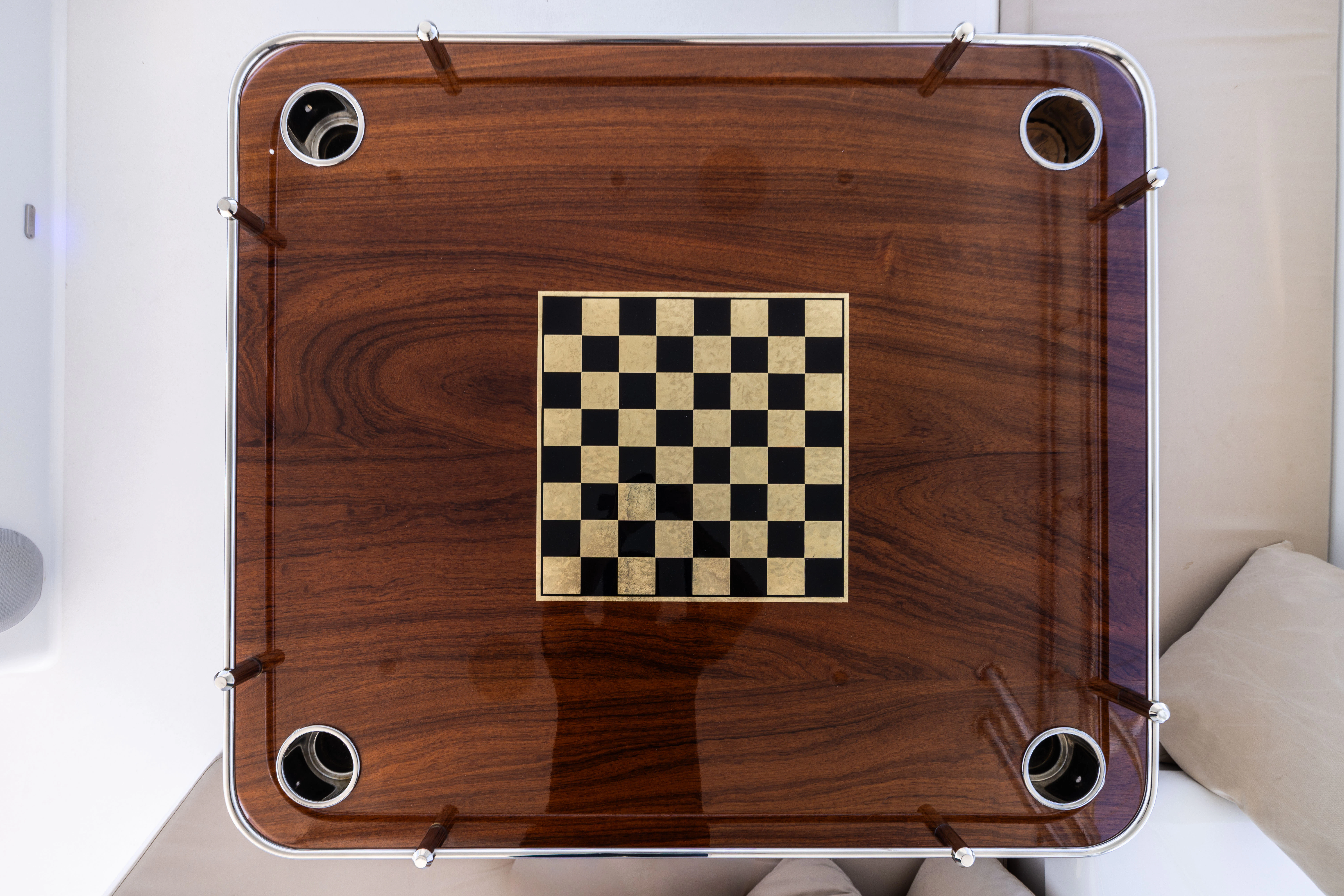 a wood cabinet with a checkered pattern aboard VERTIGO Yacht for Sale