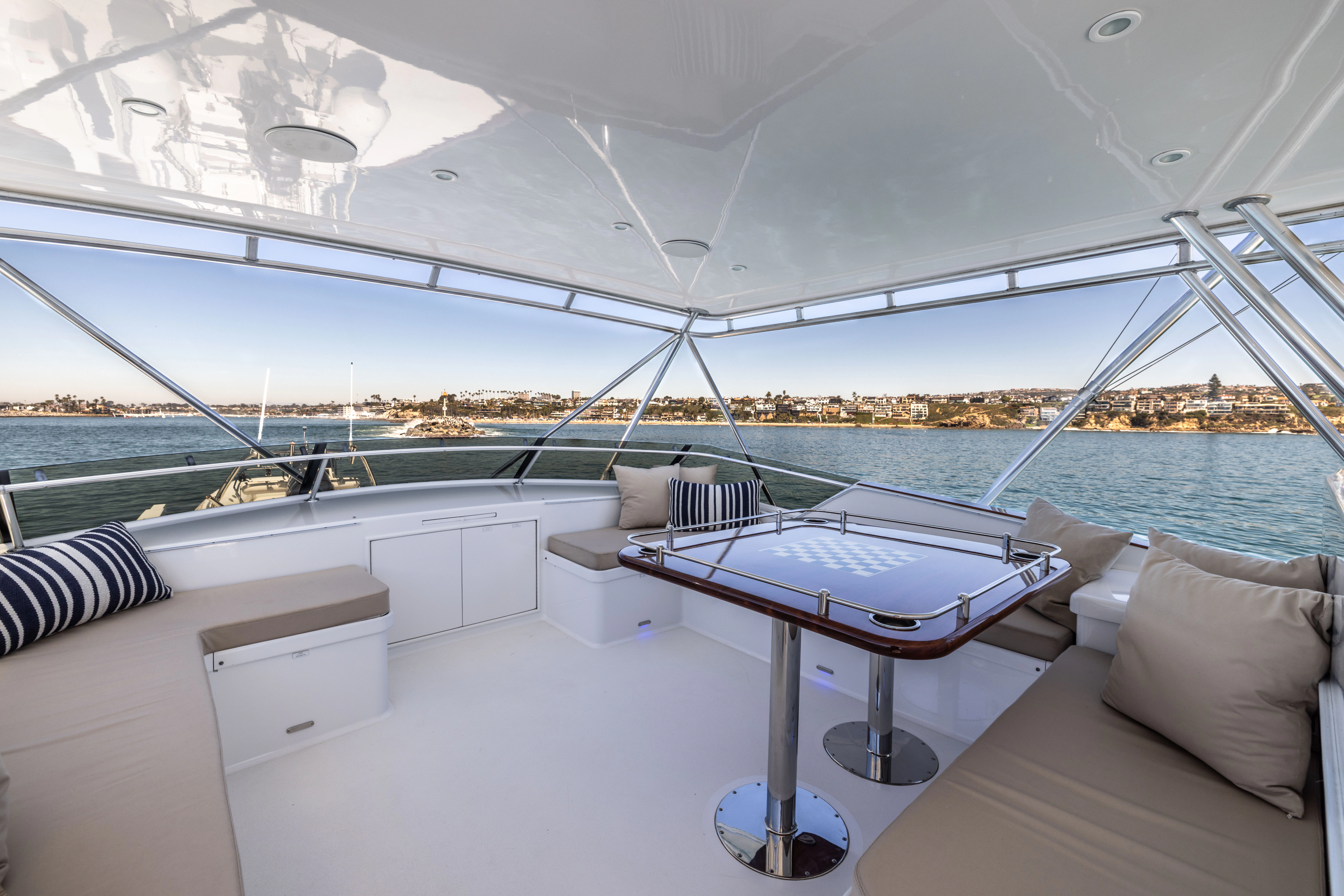 a room with a table and chairs aboard VERTIGO Yacht for Sale