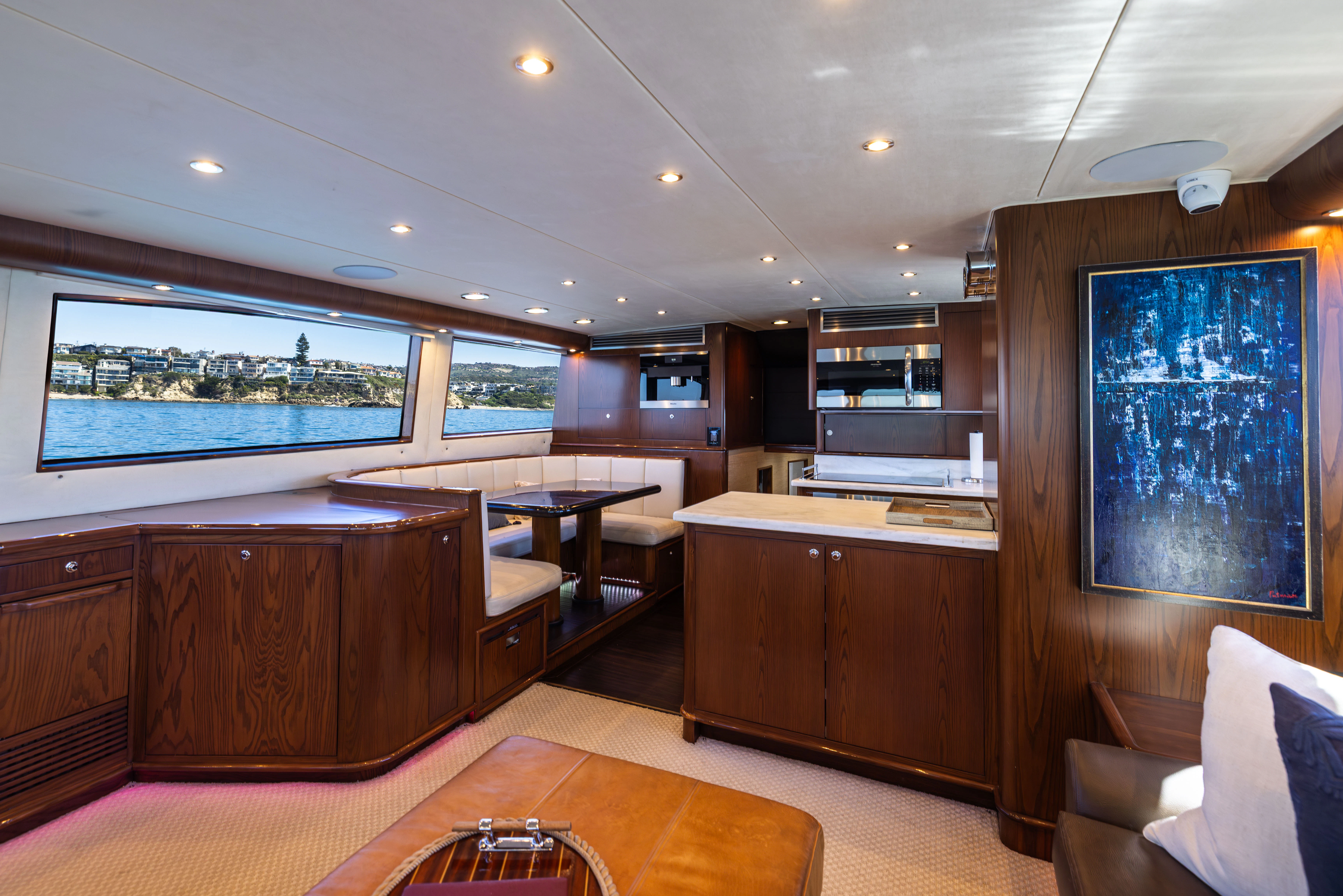 a large kitchen with a large window aboard VERTIGO Yacht for Sale