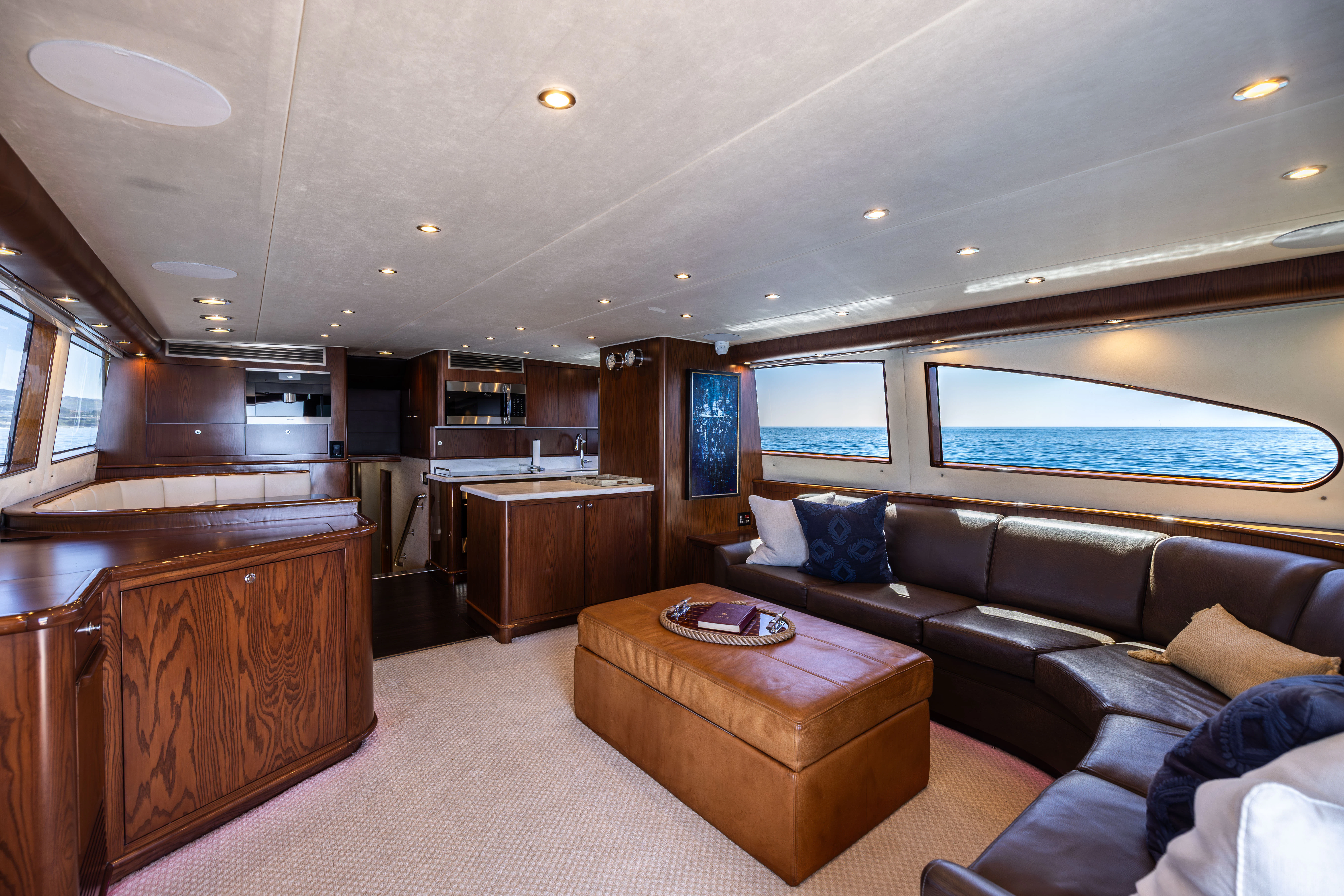 a living room with a large screen aboard VERTIGO Yacht for Sale