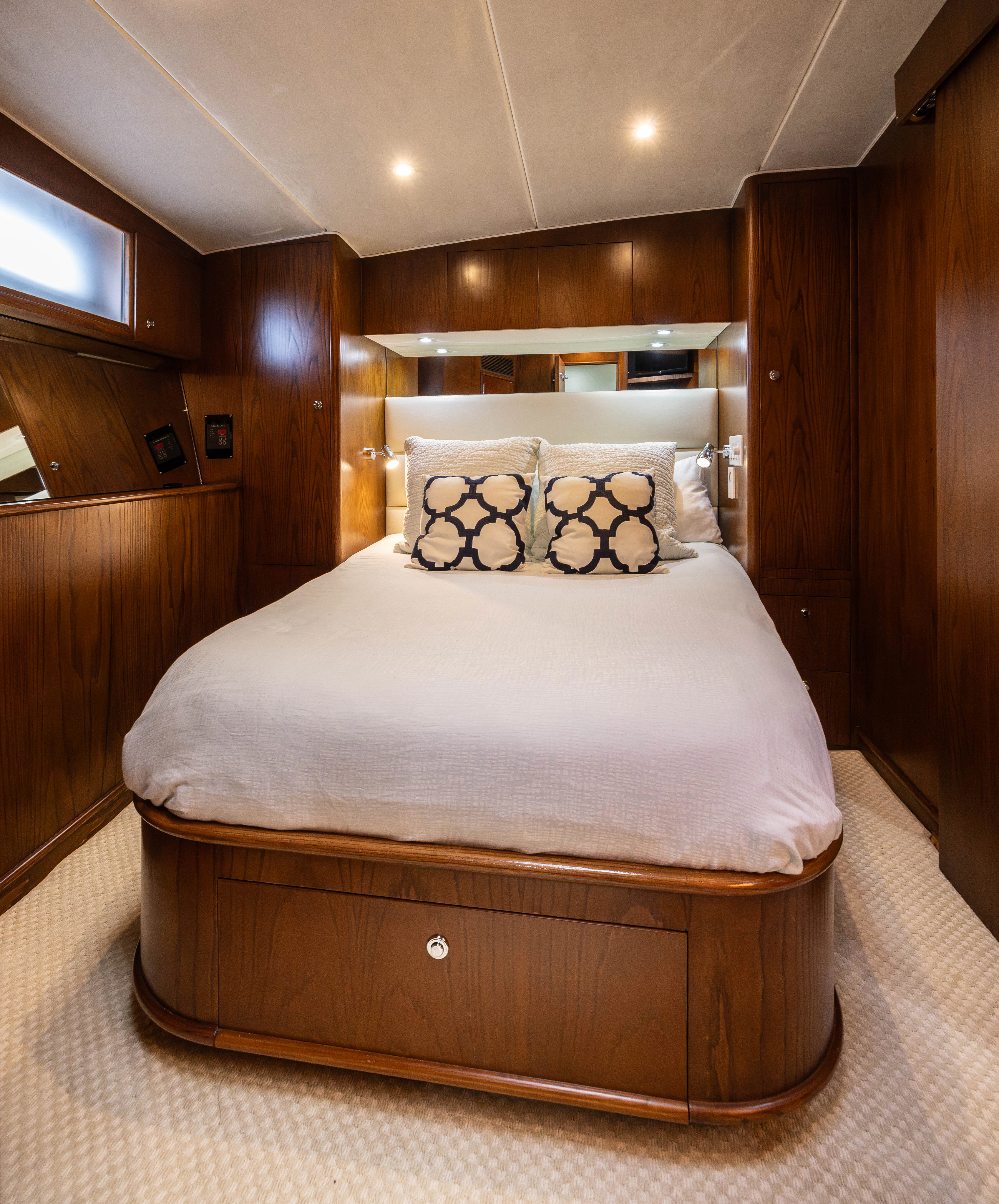a bed in a room aboard VERTIGO Yacht for Sale