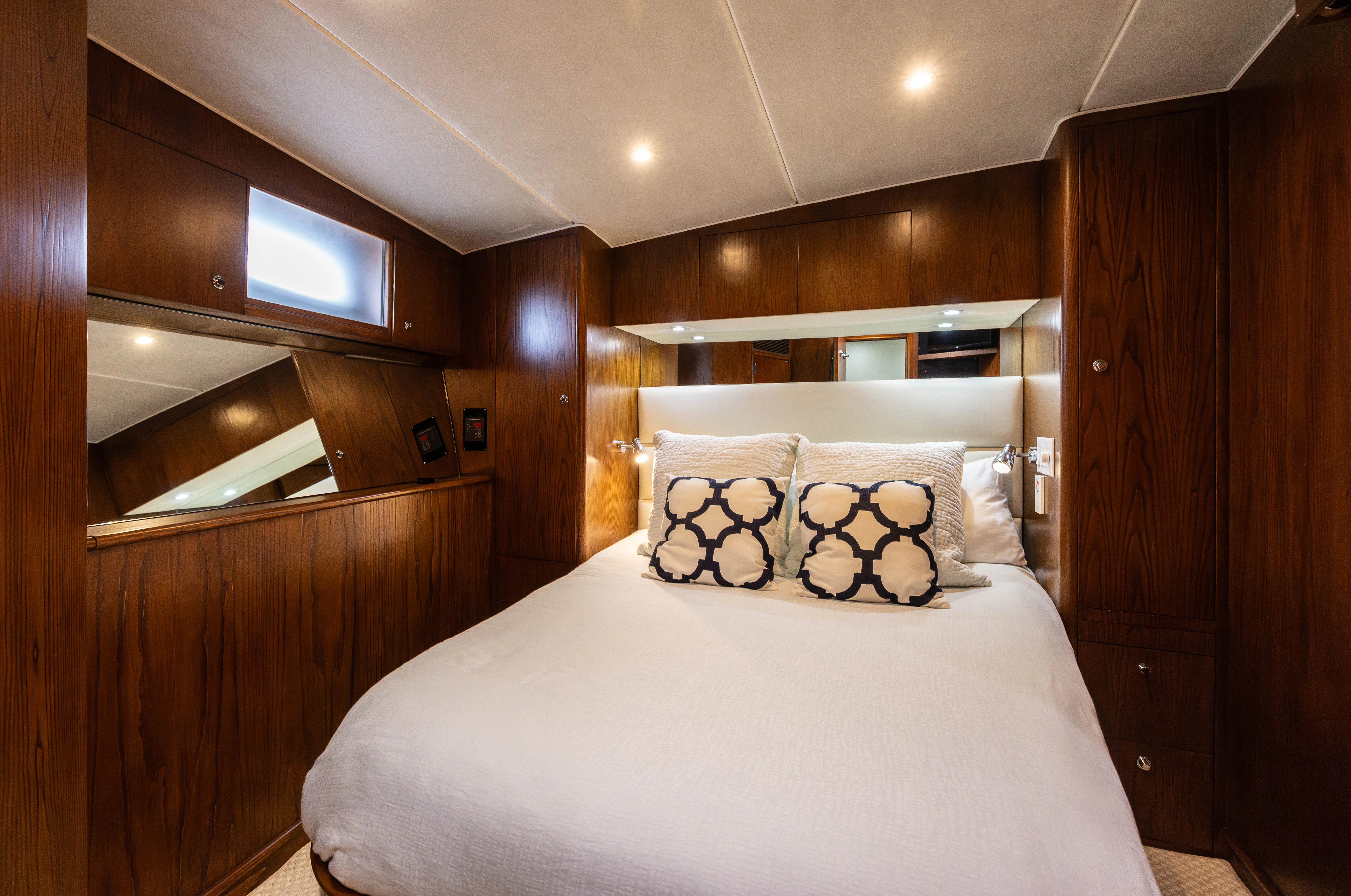 a bed in a room aboard VERTIGO Yacht for Sale