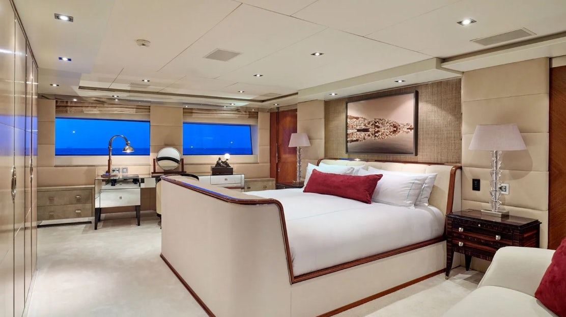 a large bedroom with a large bed aboard TIMBUKTU Yacht for Charter