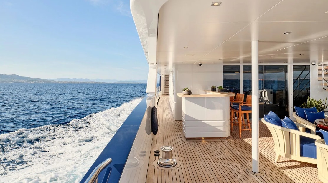a large balcony overlooking the ocean aboard TIMBUKTU Yacht for Charter