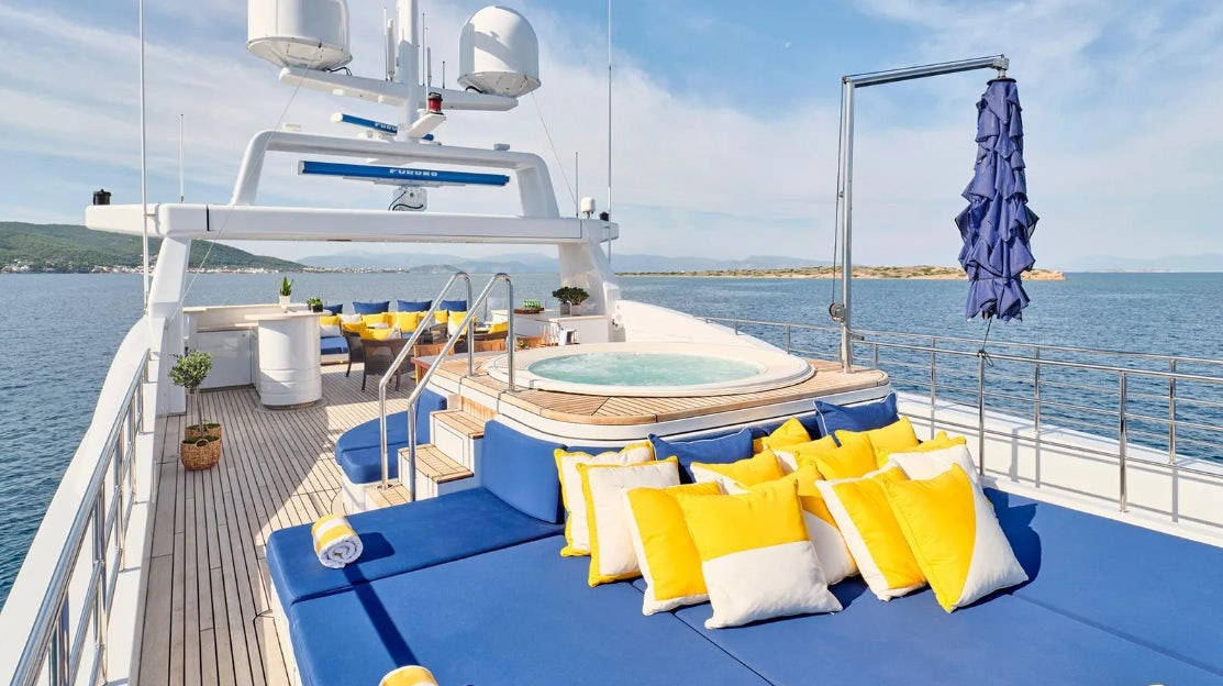 a boat on a deck aboard TIMBUKTU Yacht for Charter