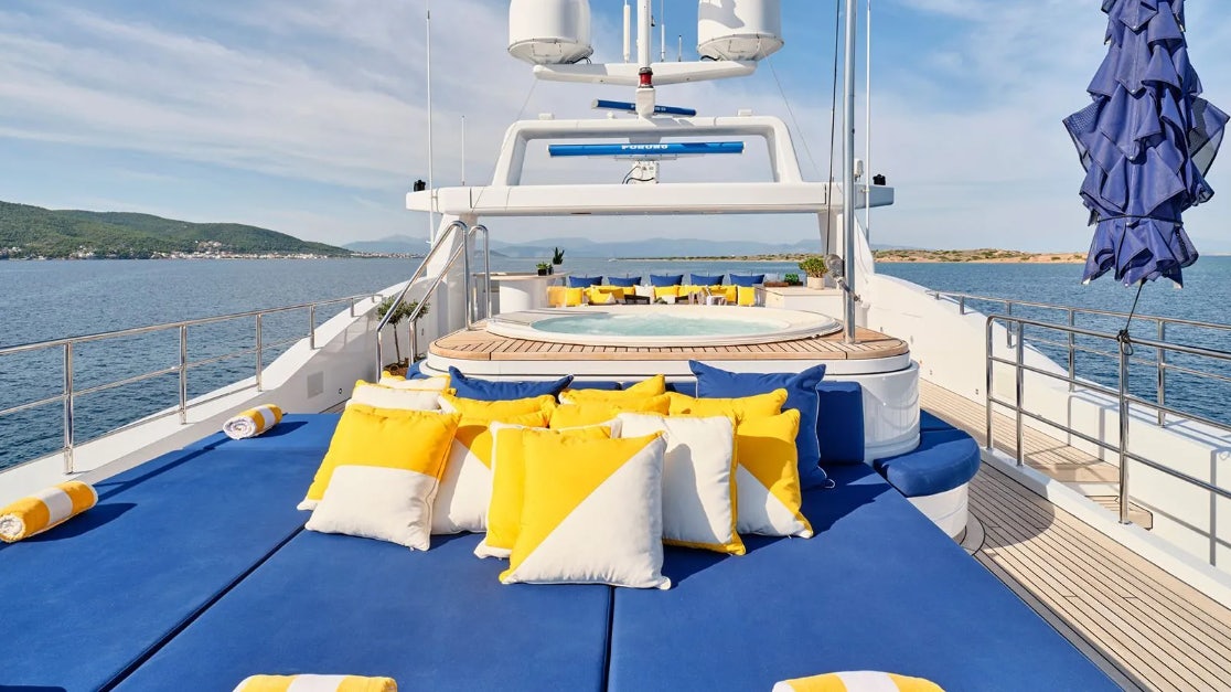a boat on a body of water aboard TIMBUKTU Yacht for Charter