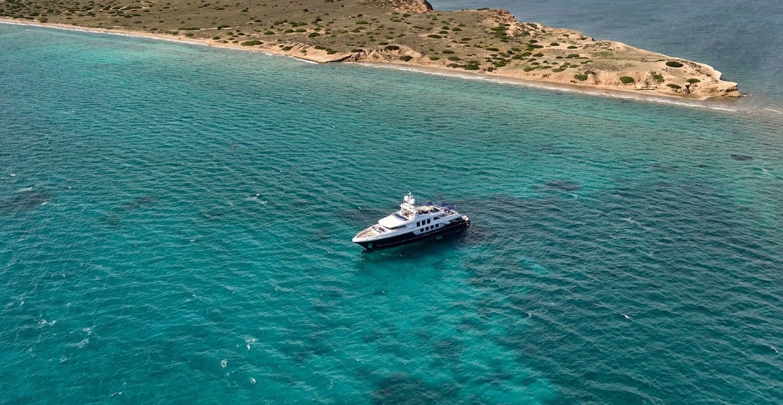 a boat in the water aboard TIMBUKTU Yacht for Charter