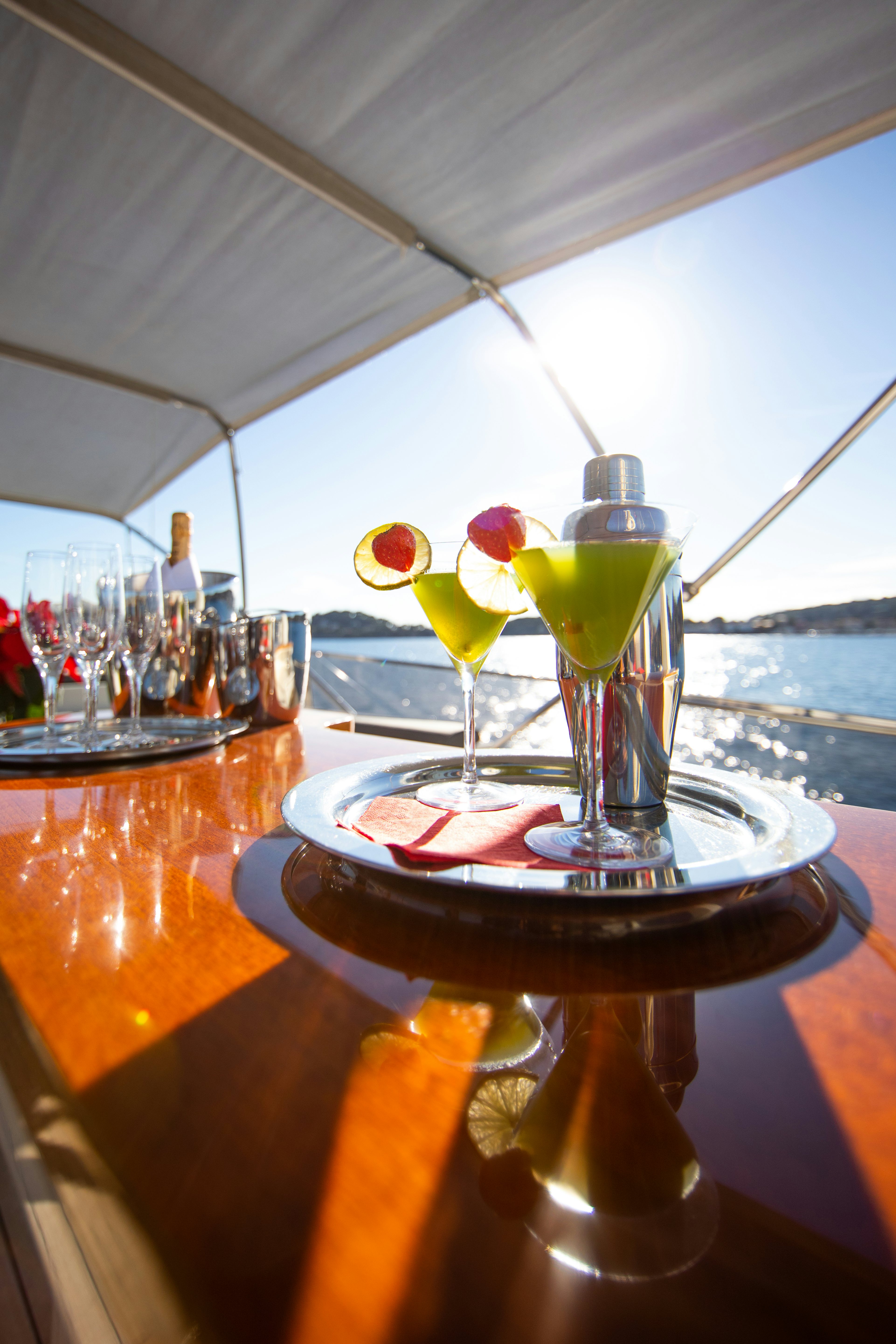 a glass of champagne on a table aboard VIKING III Yacht for Charter