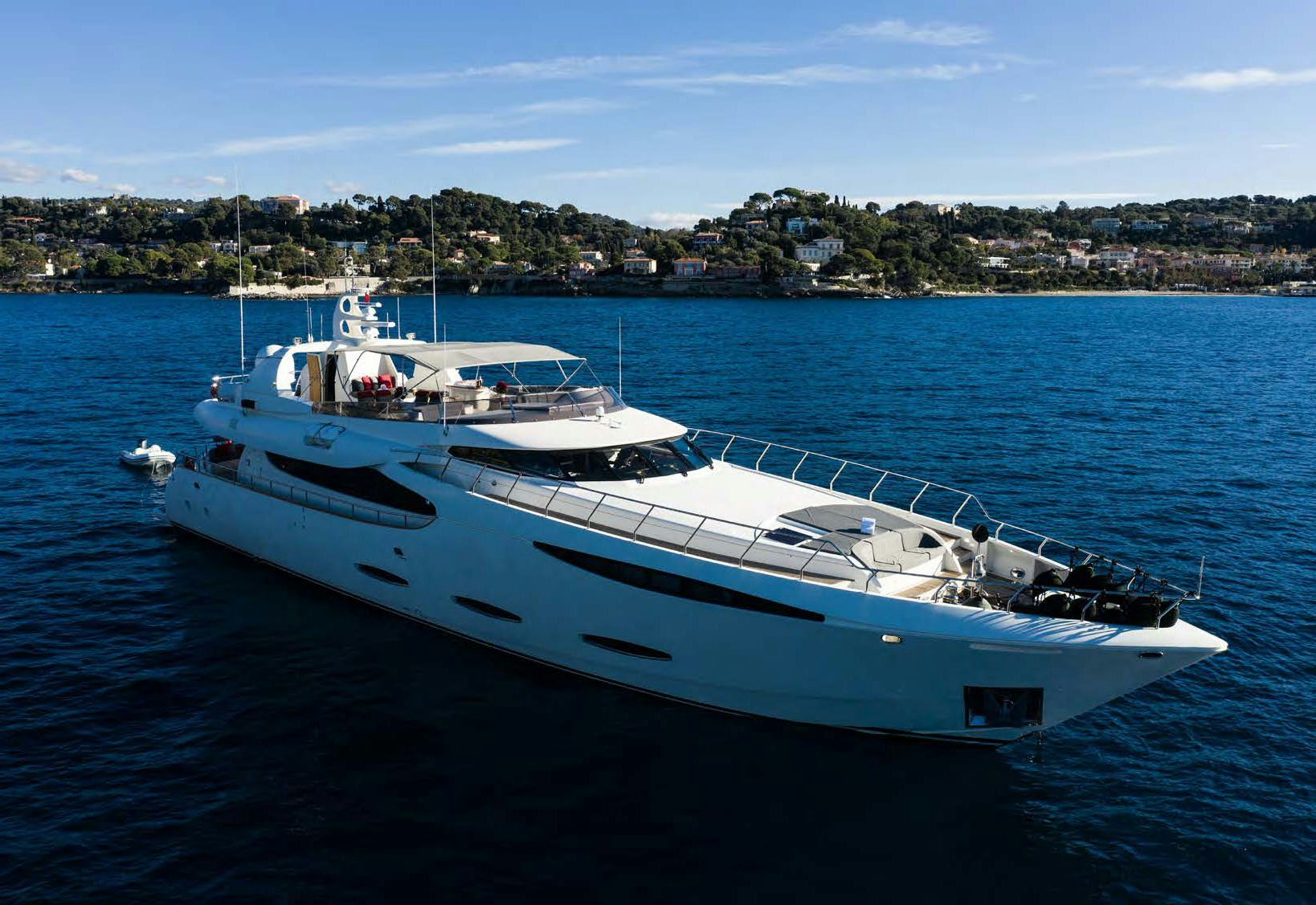 a white yacht in the water aboard VIKING III Yacht for Sale