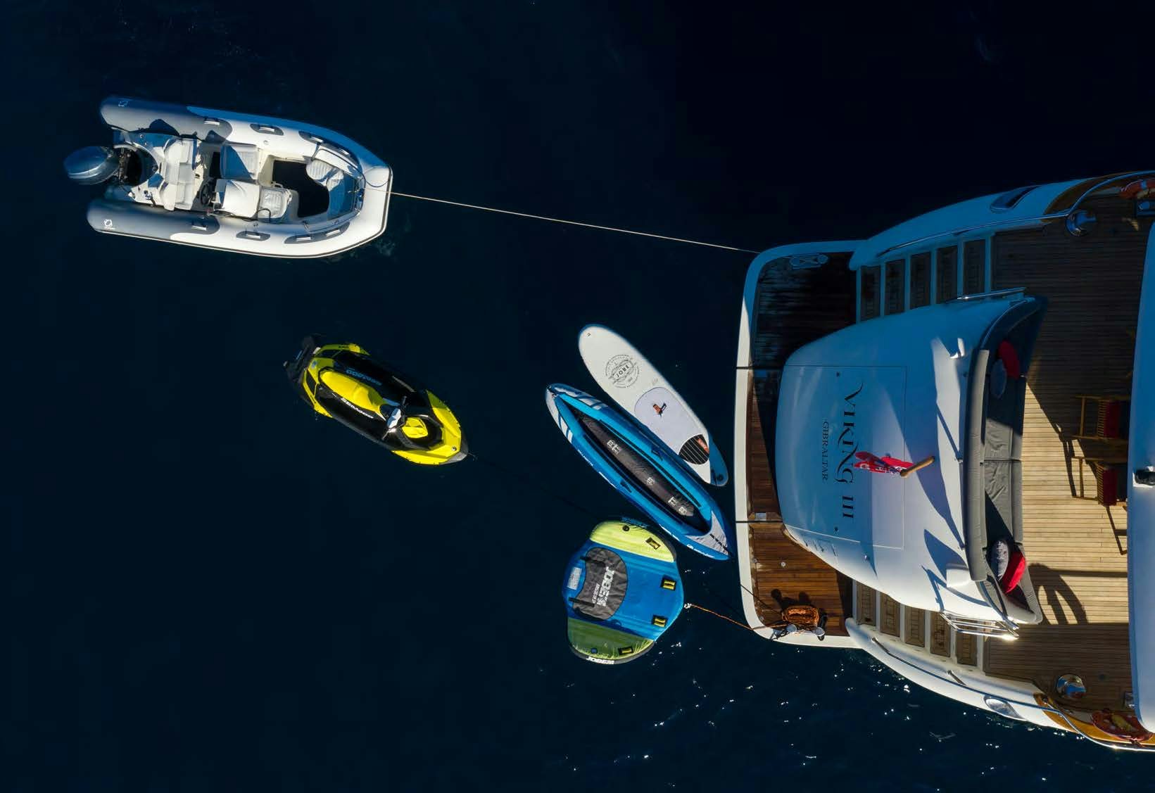 a satellite and a space shuttle aboard VIKING III Yacht for Sale