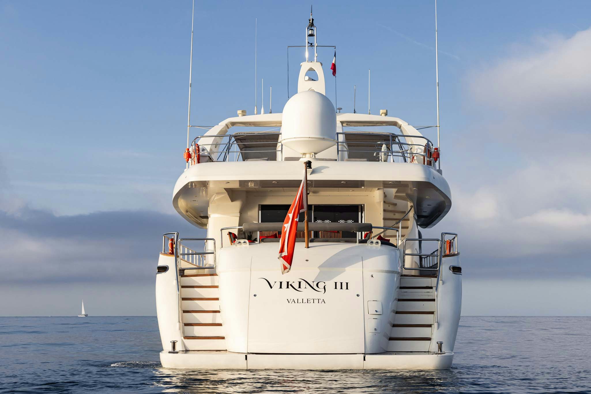 a white boat in the water aboard VIKING III Yacht for Charter