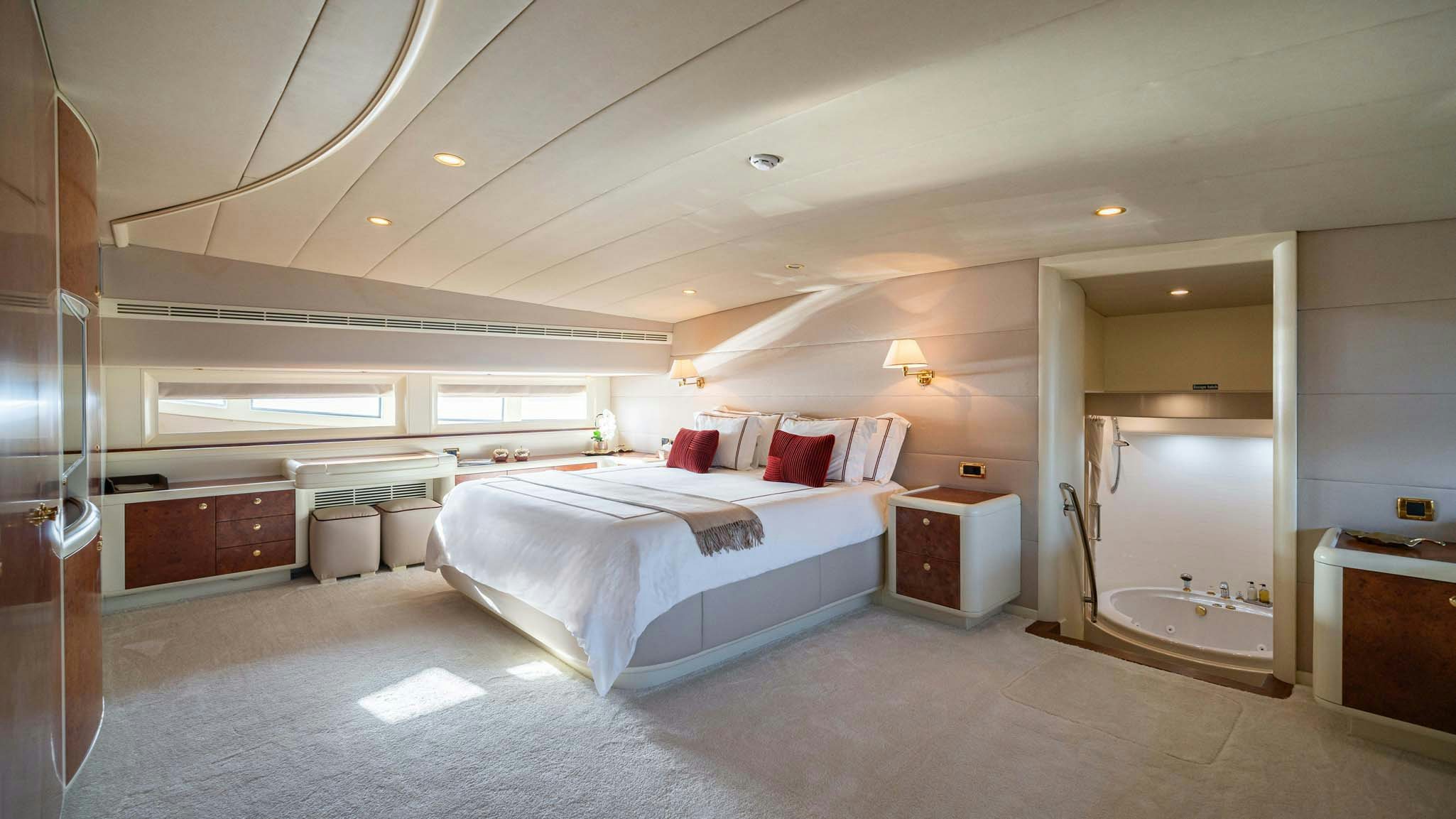 a large bedroom with a large bed aboard VIKING III Yacht for Charter