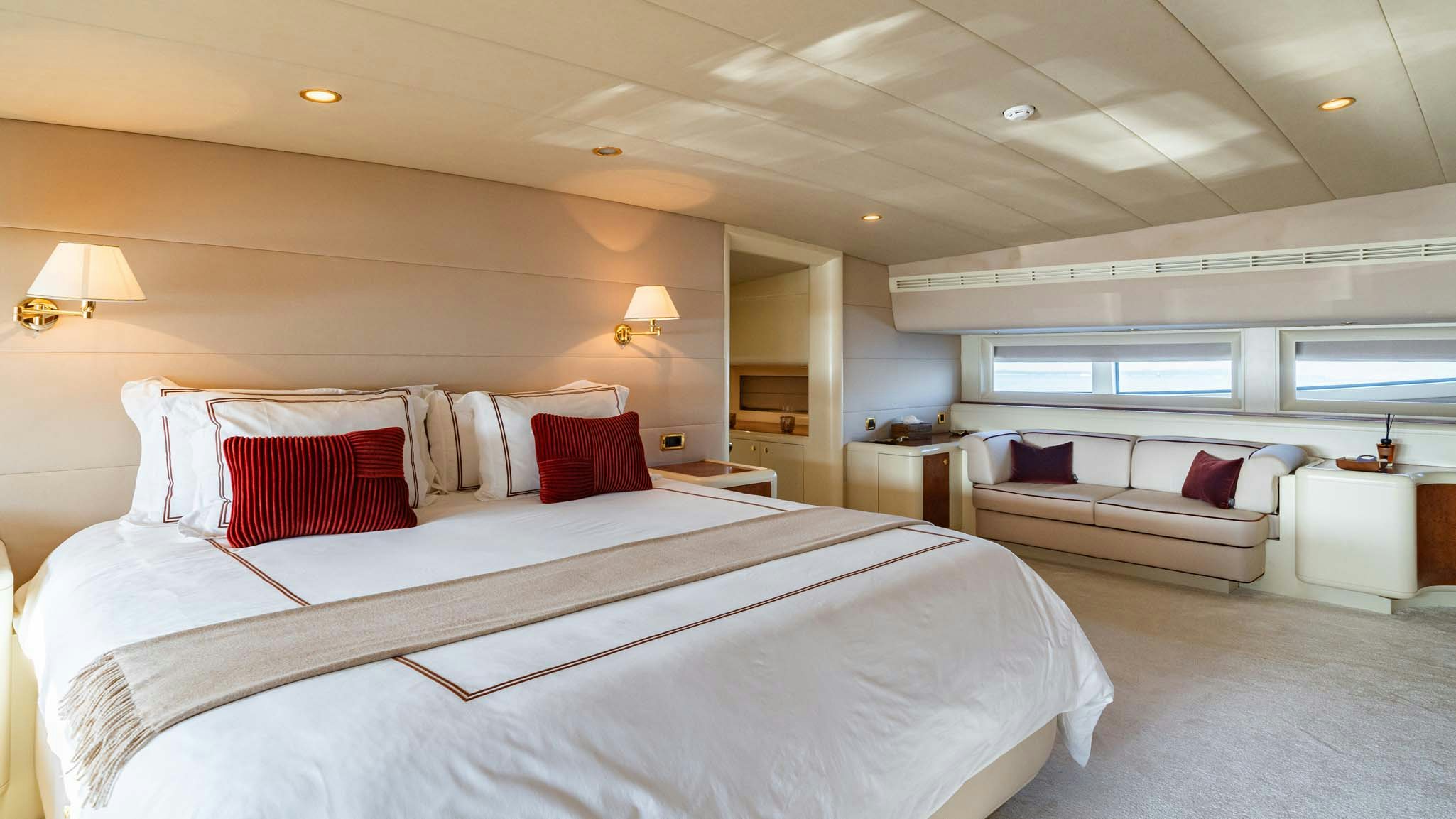 a large bedroom with a large bed aboard VIKING III Yacht for Charter